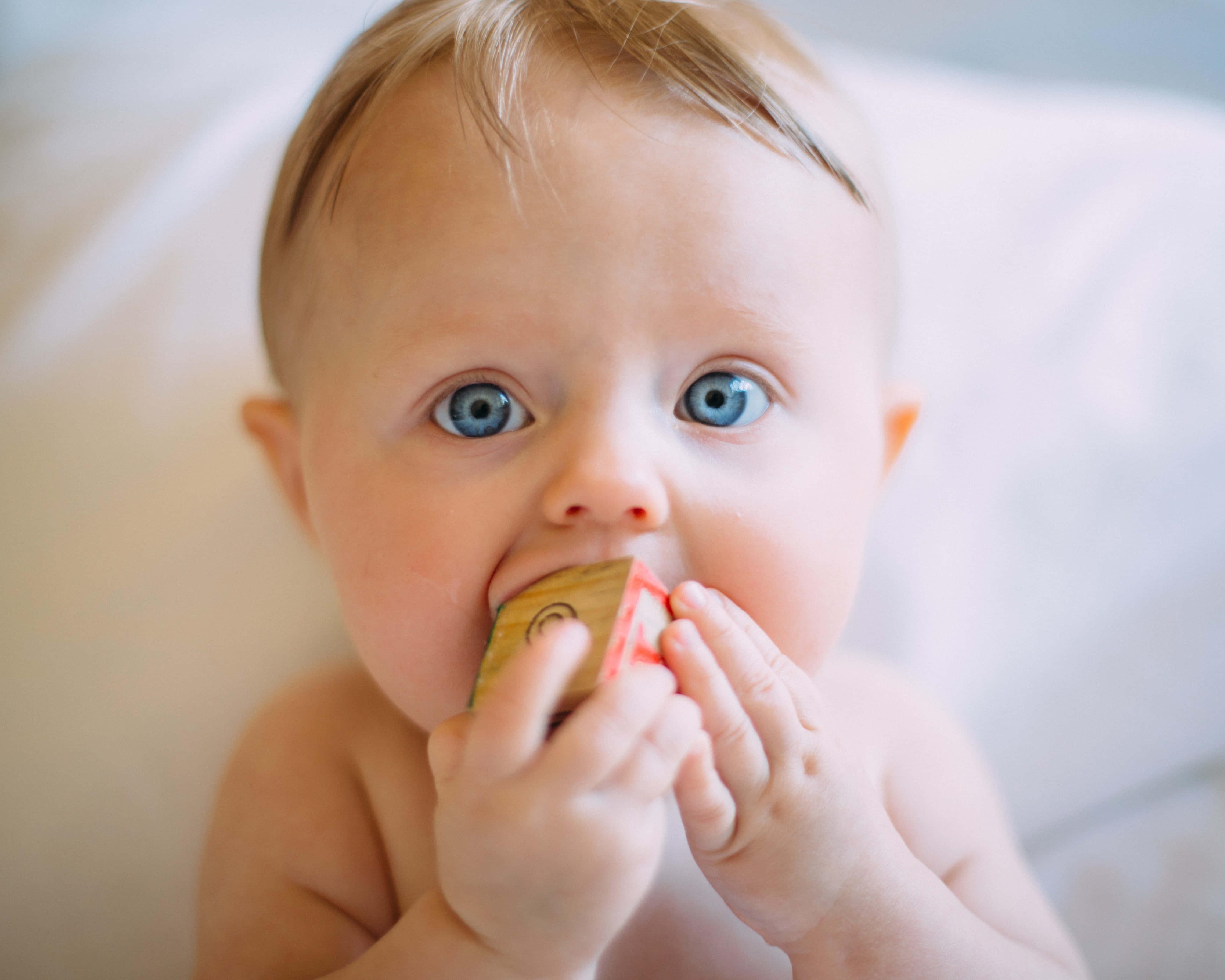 A smiling newborn baby boy, ready to take on the world — 4560x3648 wallpaper