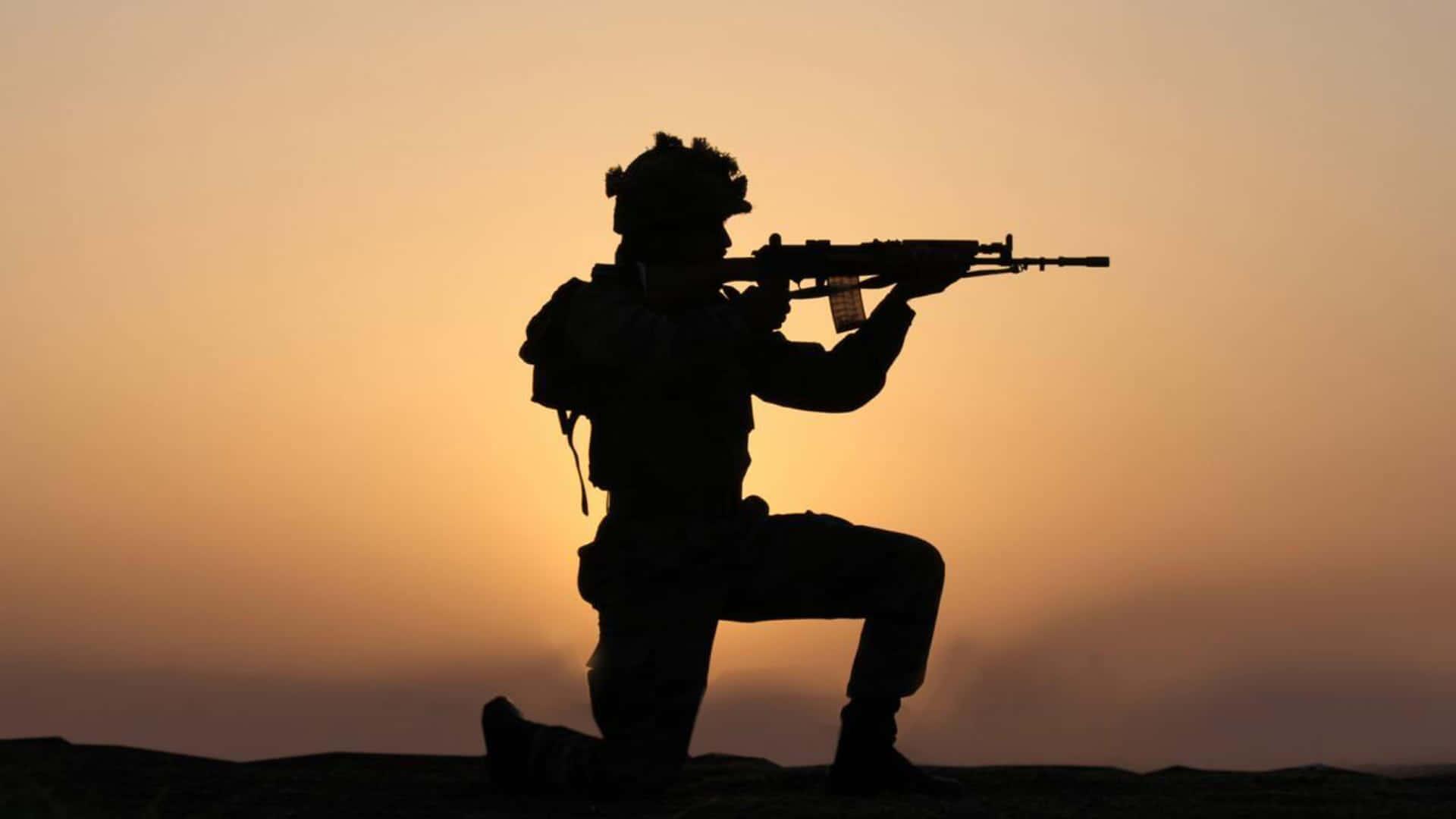a soldier is silhouetted at sunset — 1920x1080 wallpaper
