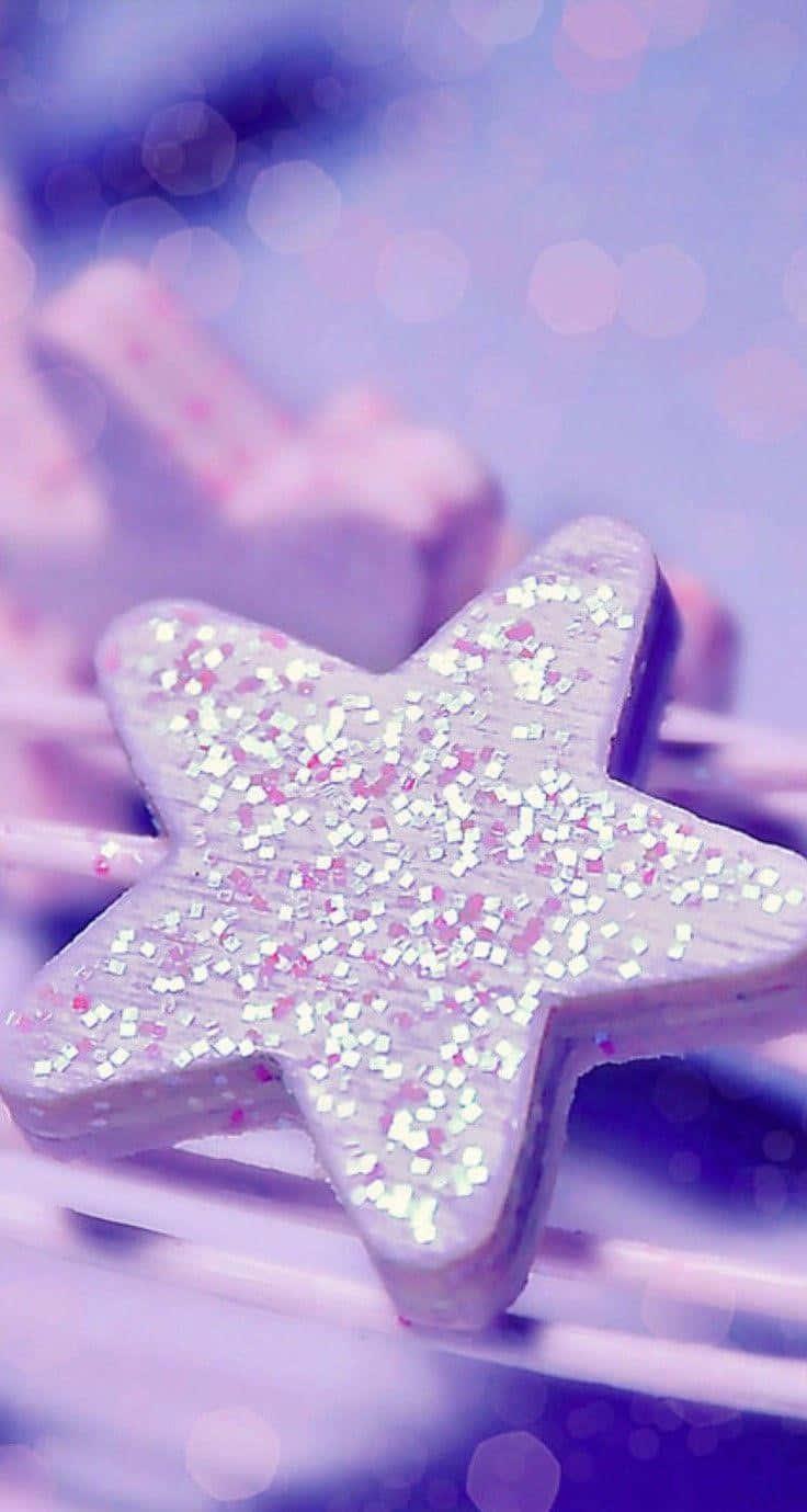 a star shaped cookie on a purple background — 736x1379 wallpaper