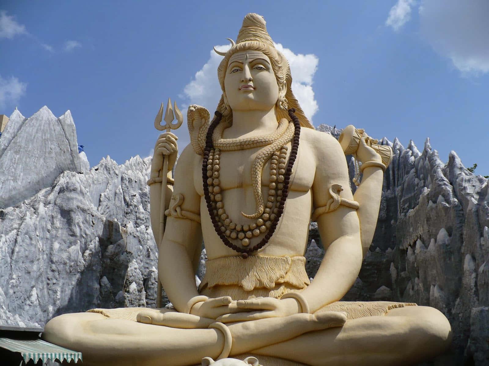 a statue of lord shiva in front of mountains — 1600x1200 wallpaper