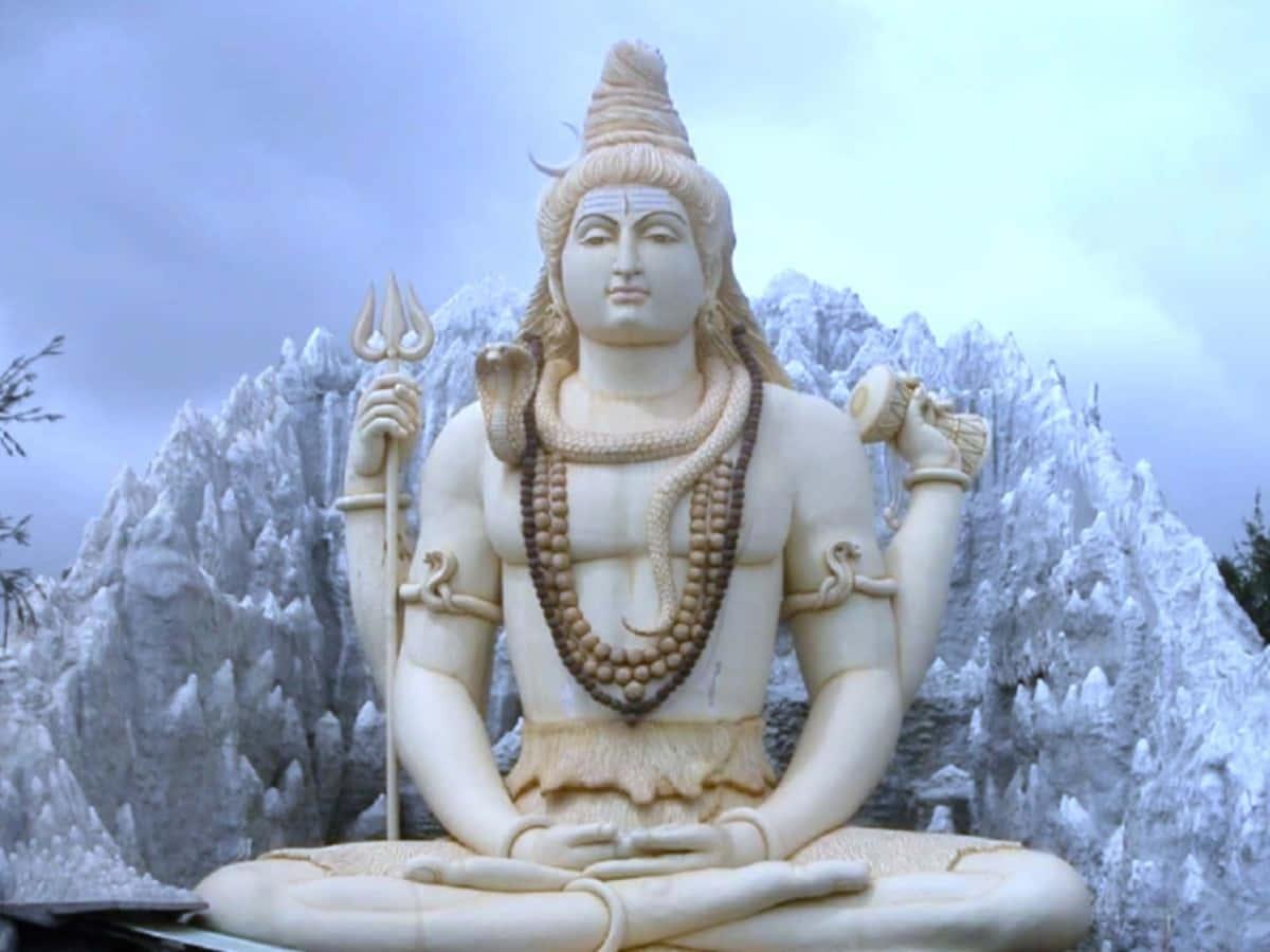 a statue of lord shiva sitting in front of a mountain — 1200x900 wallpaper