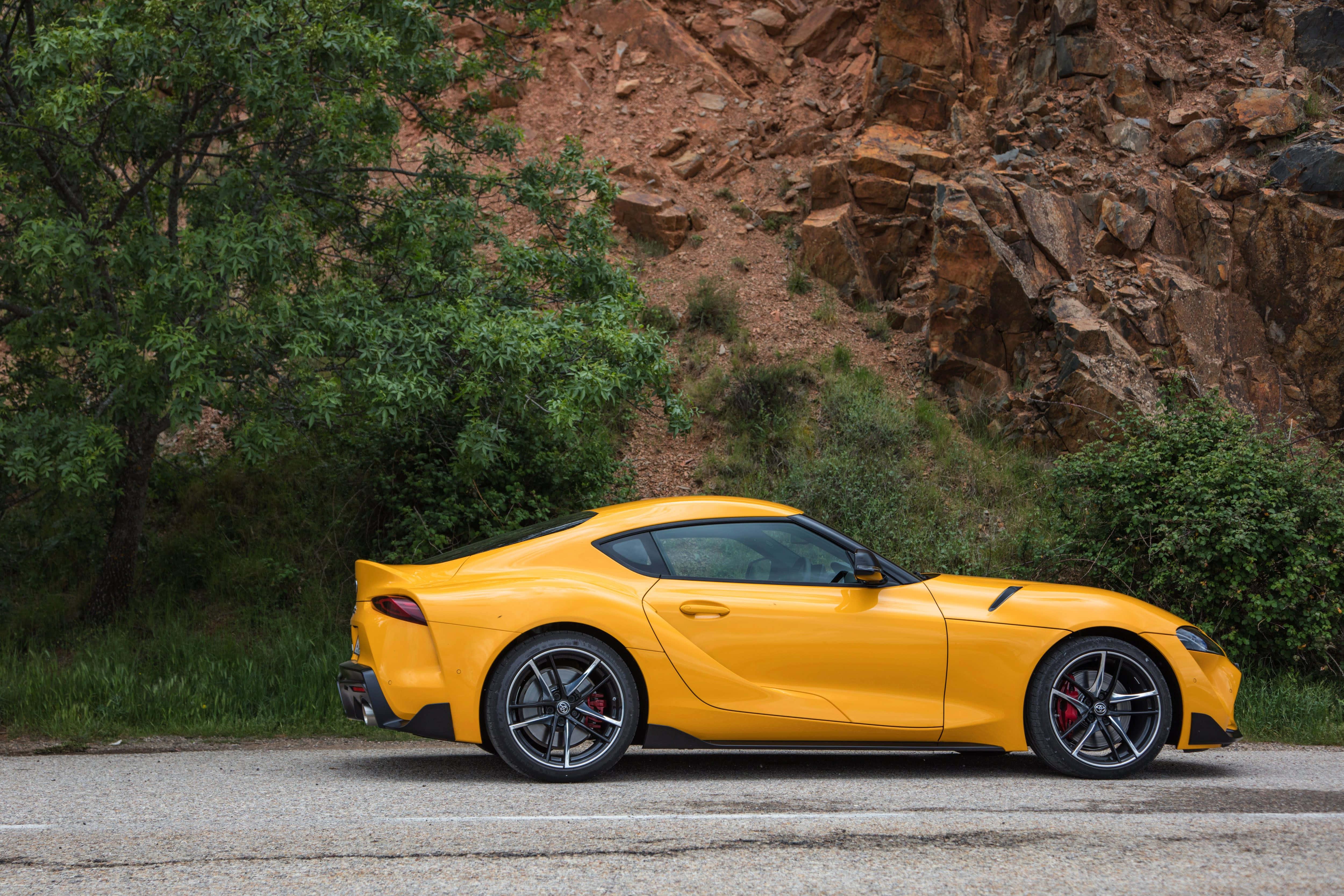 A stunning Toyota Supra sports car on display in a picturesque landscape. — 5000x3333 wallpaper