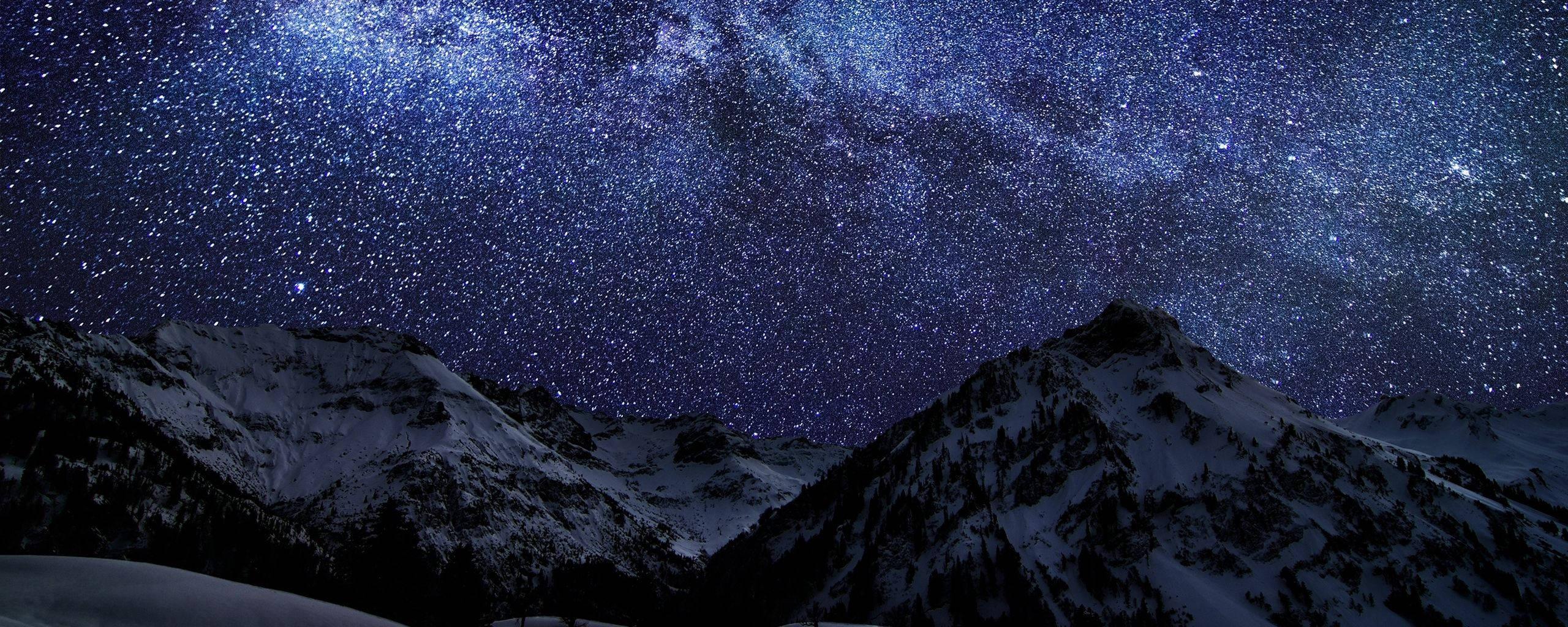 A Vibrant Night in the Mountains — 2560x1024 wallpaper