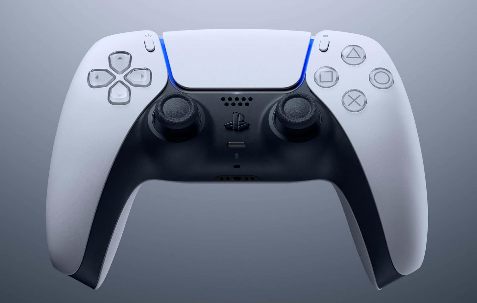 a white playstation controller with buttons on it — 2000x1270 wallpaper