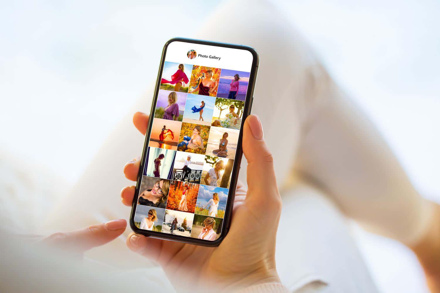 a woman holding a phone with pictures on it — 1500x1000 wallpaper
