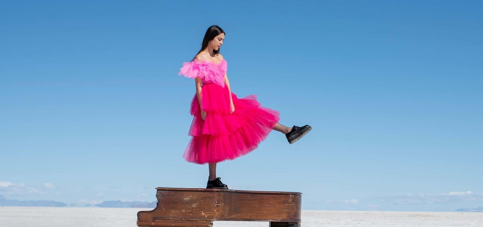 Actress and singer Olivia Rodrigo in her music video for the song 'driver's license' — 1920x903 wallpaper