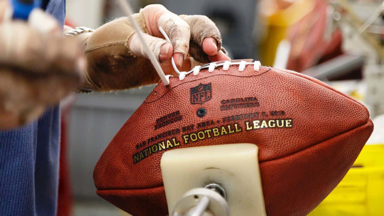 AFootballer Taking On His Opponents With Skill and Precision — 1296x729 wallpaper
