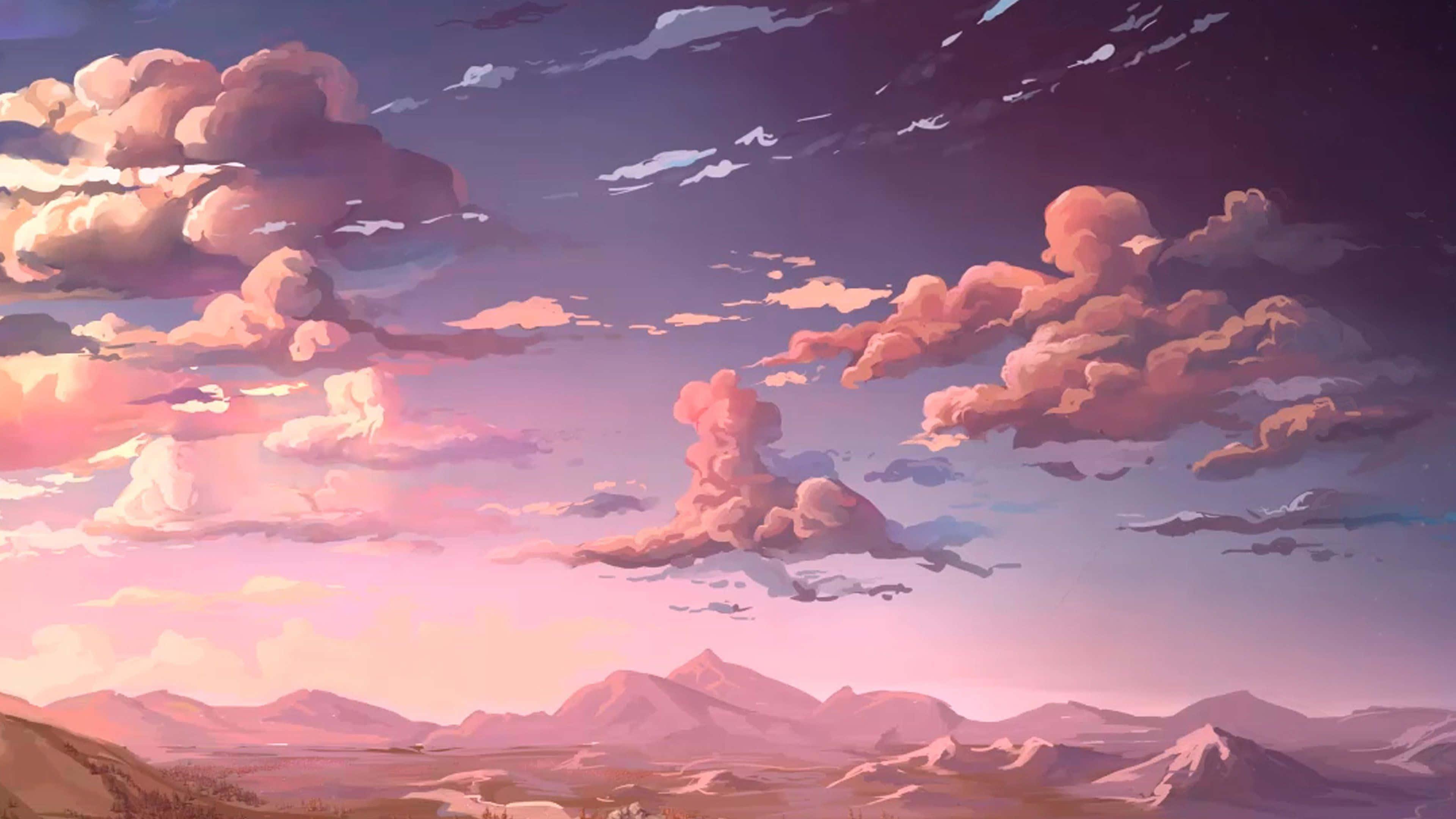 An aesthetically stunning computer laptop sitting atop a black desk and showing vibrant imagery. — 3840x2160 wallpaper