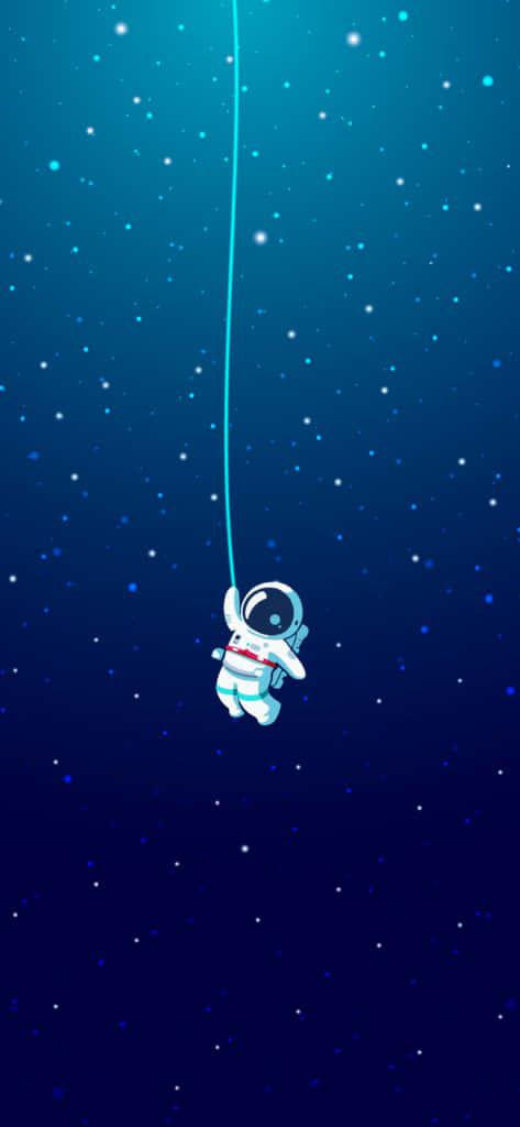an astronaut is hanging from a rope in the sky — 473x1024 wallpaper