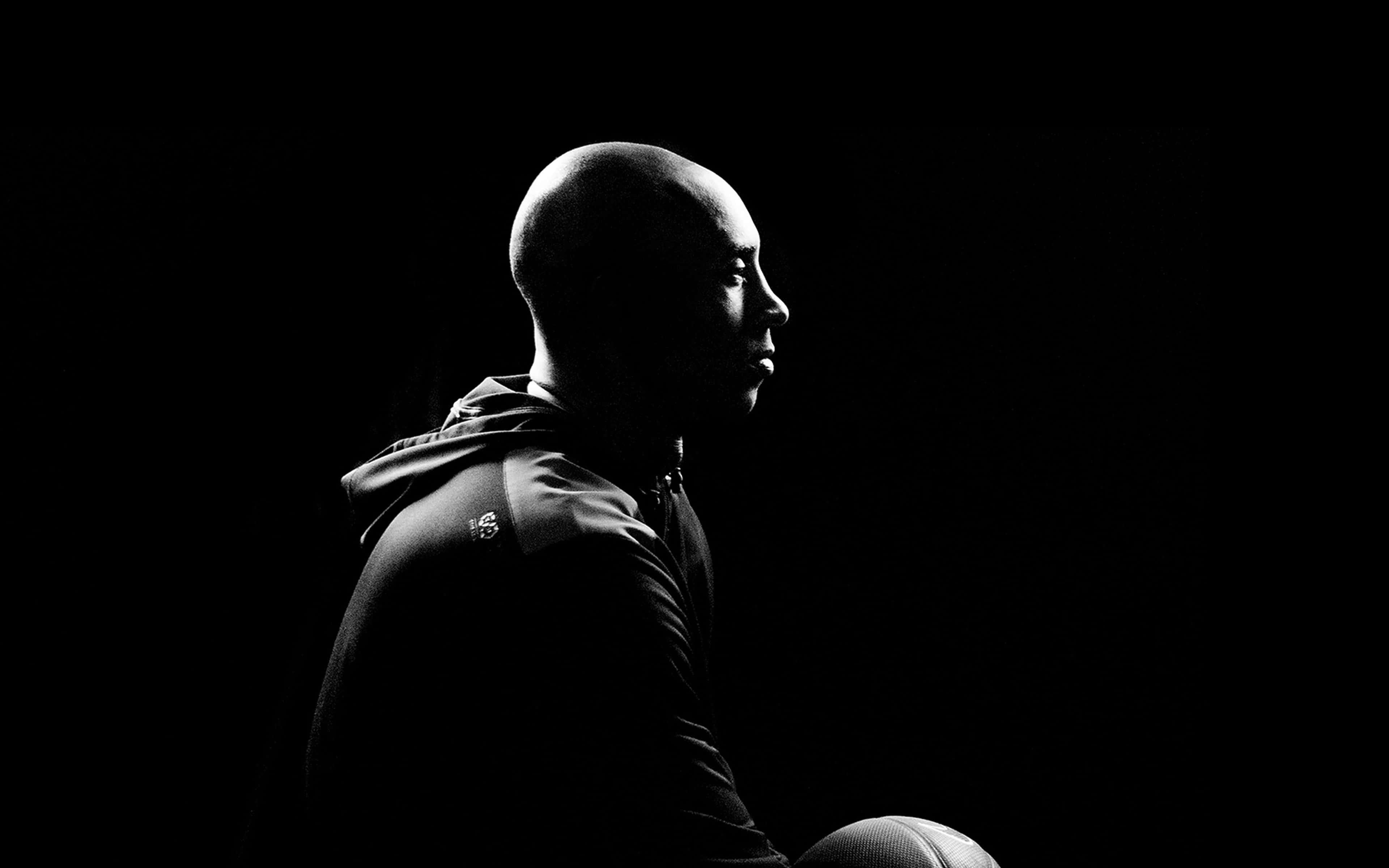An iconic photo of Kobe Bryant shooting a game-winning basket in his last NBA game. — 3840x2400 wallpaper