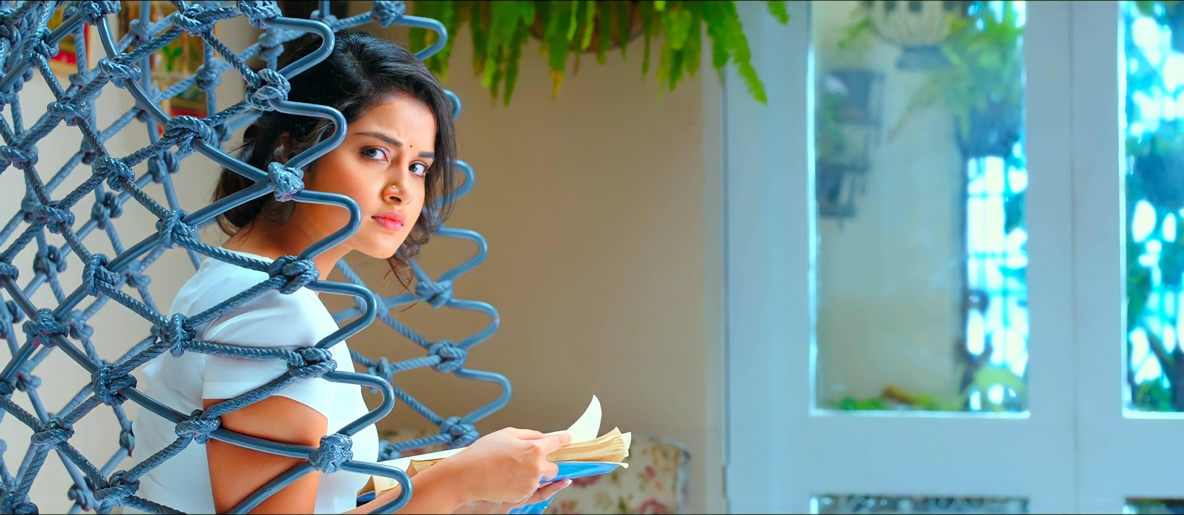 Anupama Parameswara Reading A Book — 3840x1670 wallpaper