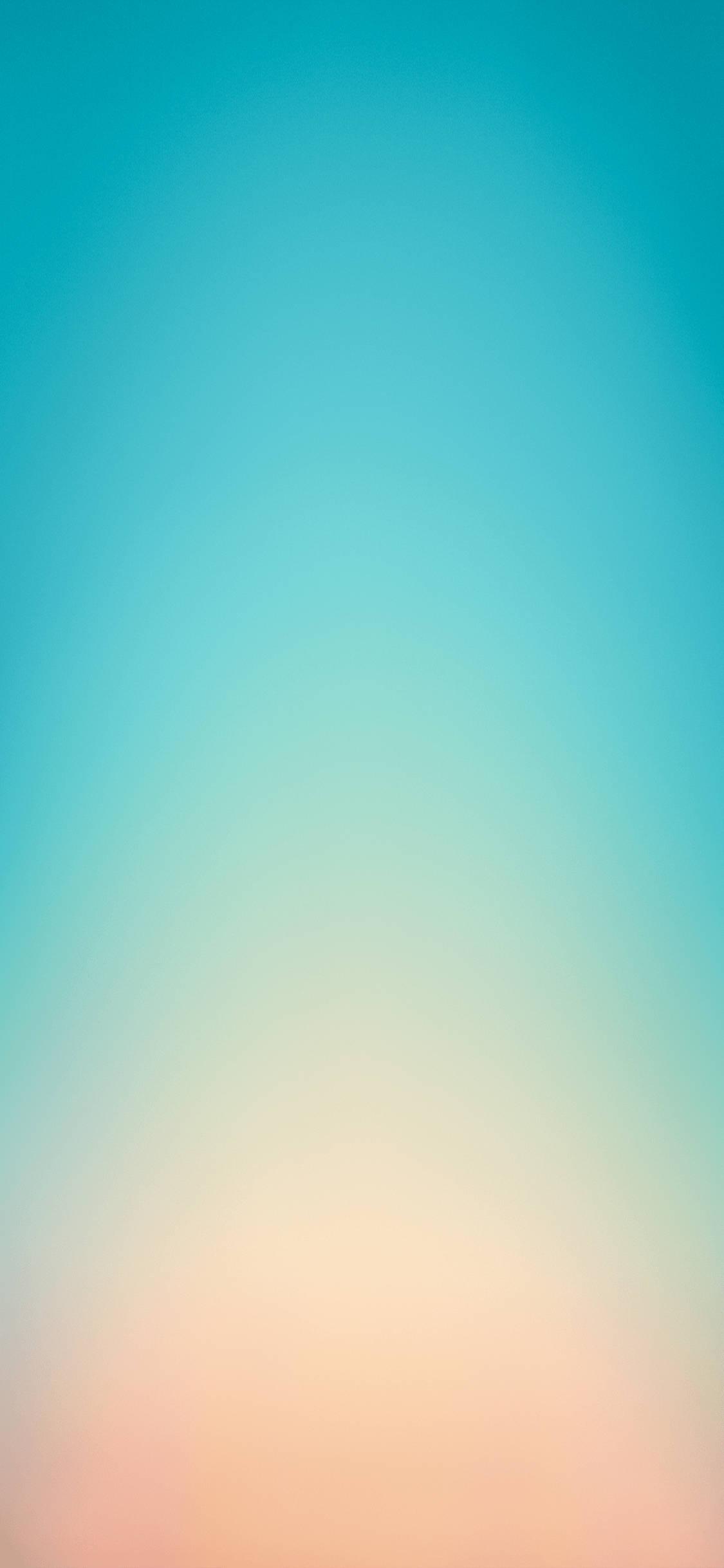 Apple iPhone Default Blue Orange Gradient — 1125x2436 wallpaper