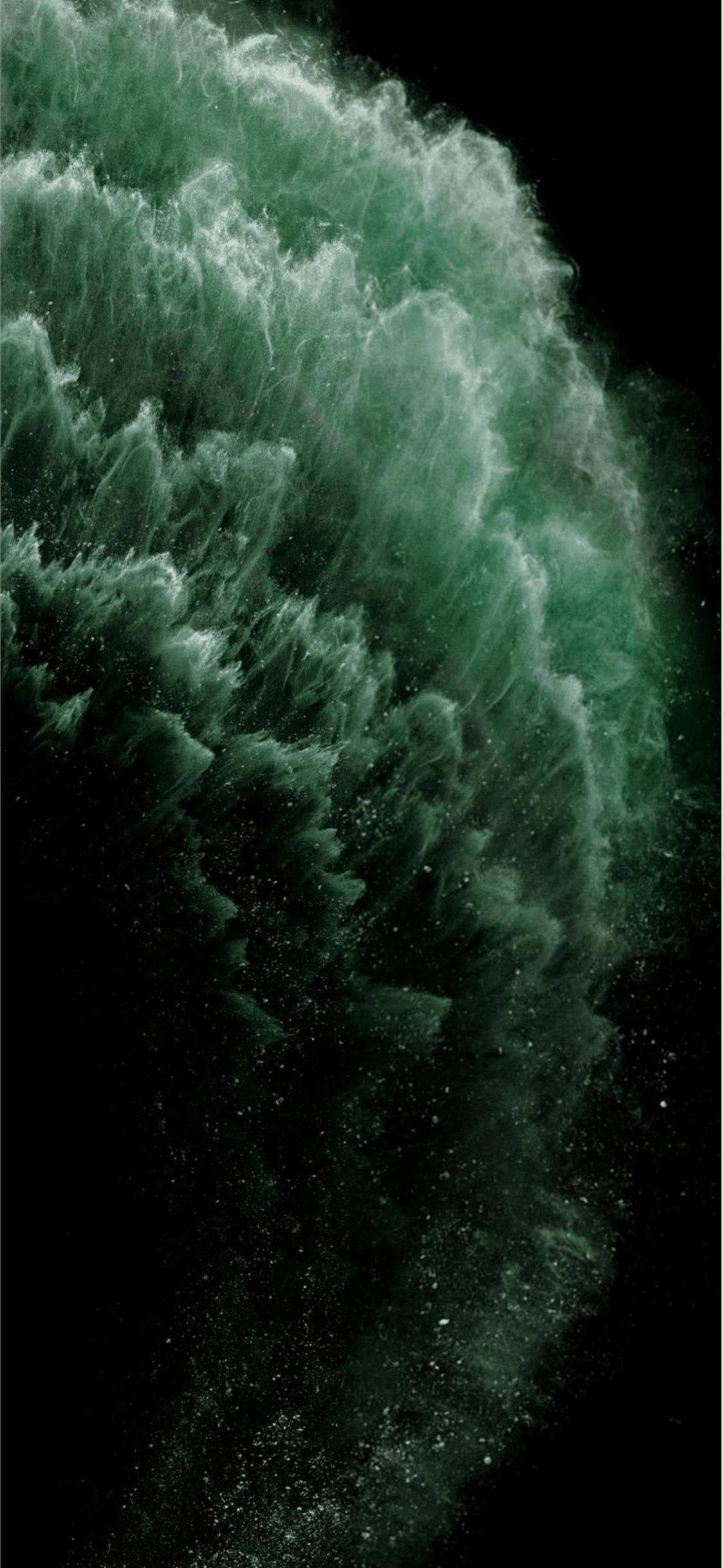 Apple iPhone Default Green Explosion — 1125x2436 wallpaper