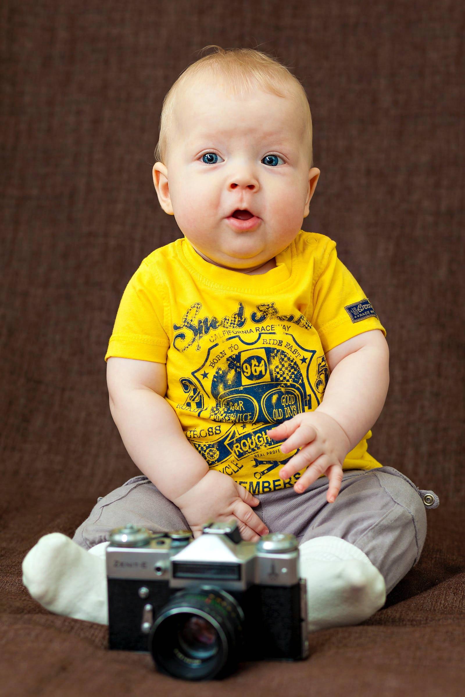 Baby Boy Wearing Yellow Shirt — 1600x2400 wallpaper