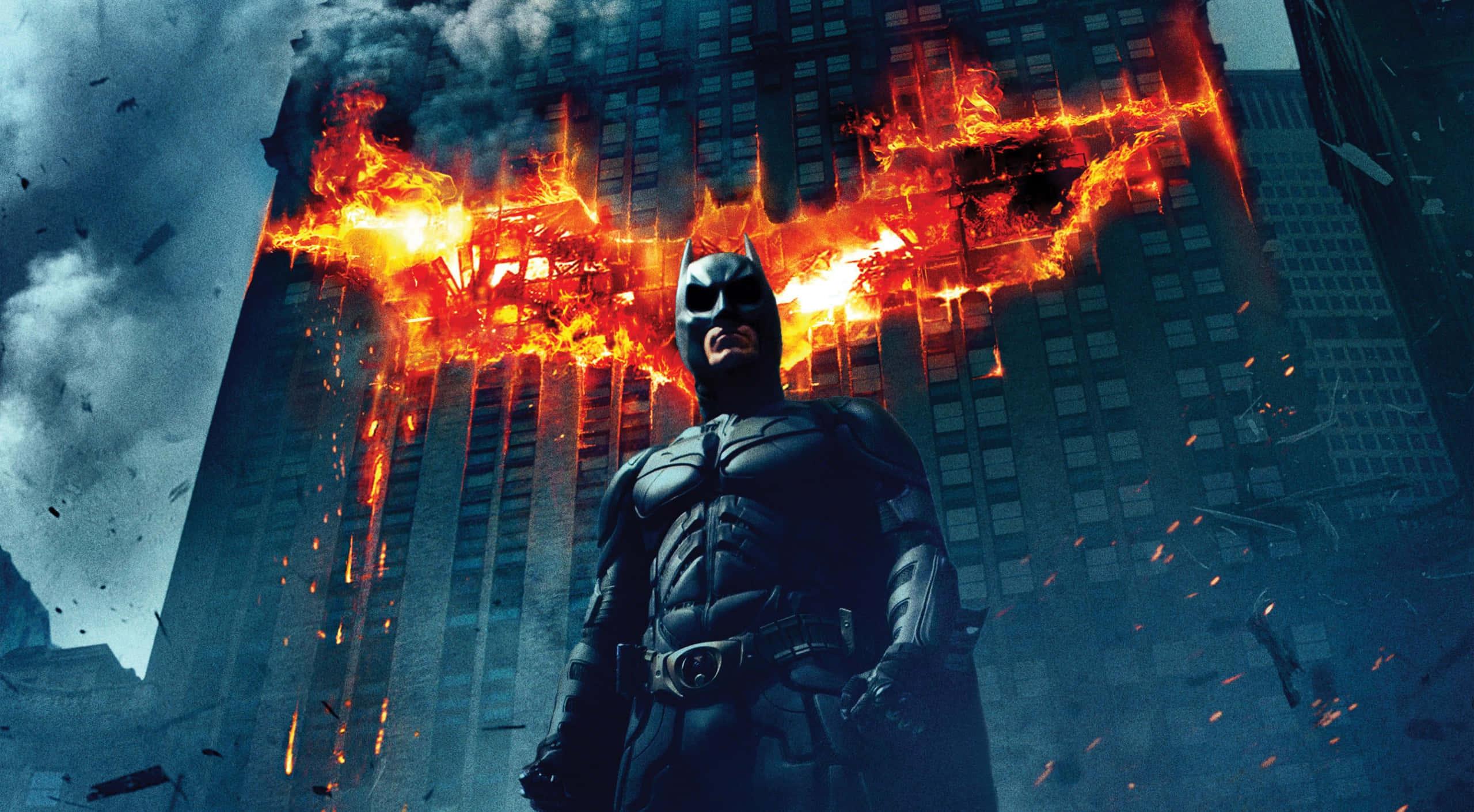 Batman Bat Logo On Fire In Building Picture — 2560x1411 wallpaper