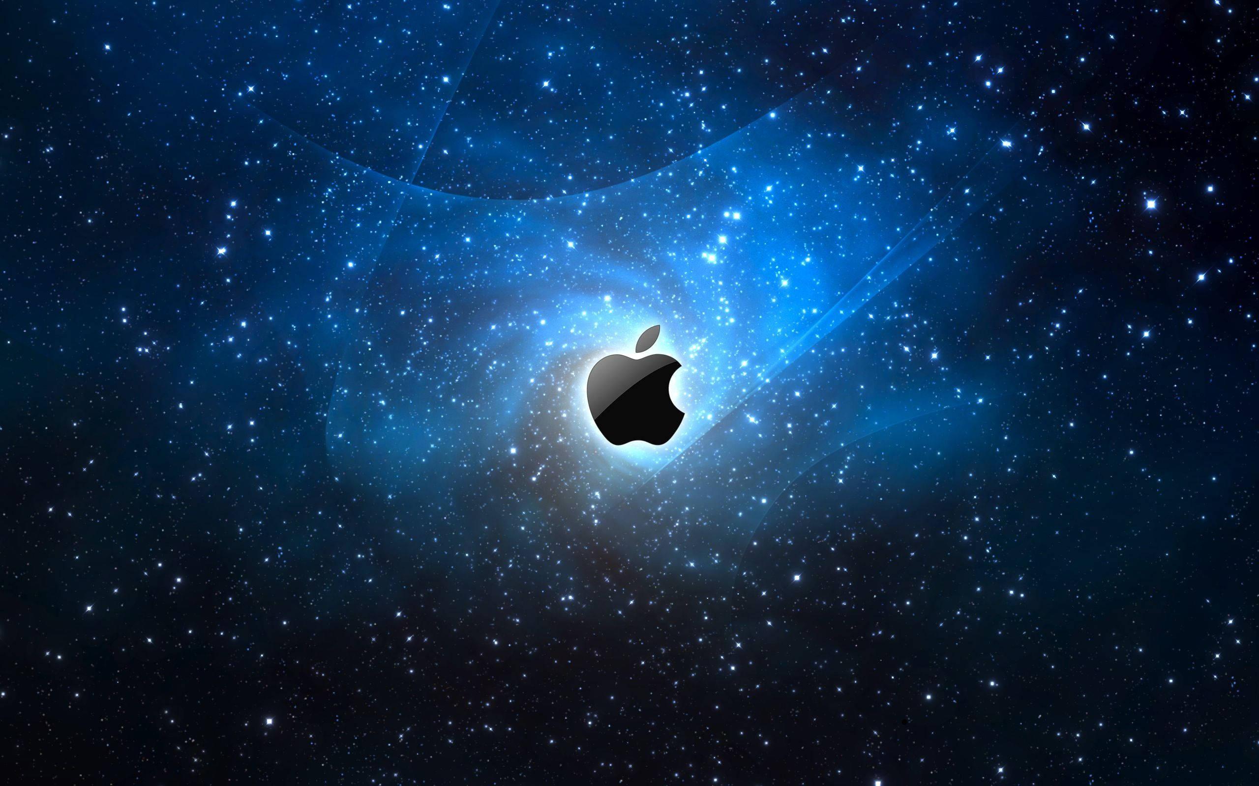 Black Apple Logo Against a Blue Galaxy — 2560x1600 wallpaper