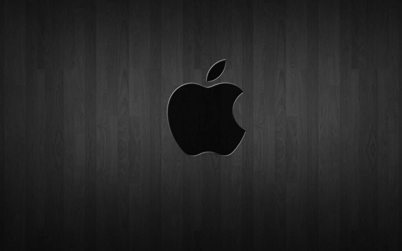 Black Apple Logo on Dark Wood — 1280x800 wallpaper