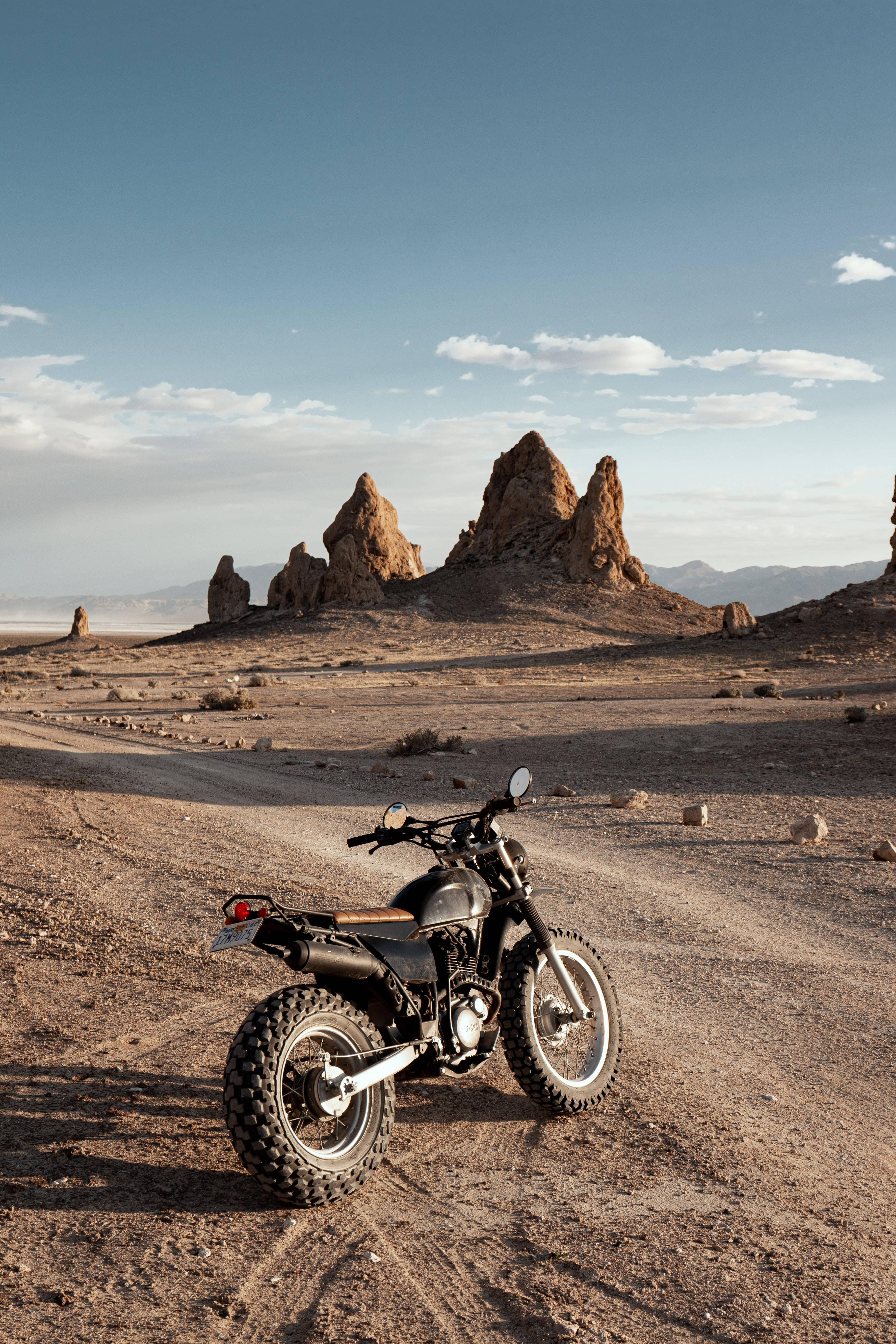 Black Motorcycle In Terrains — 3447x5168 wallpaper