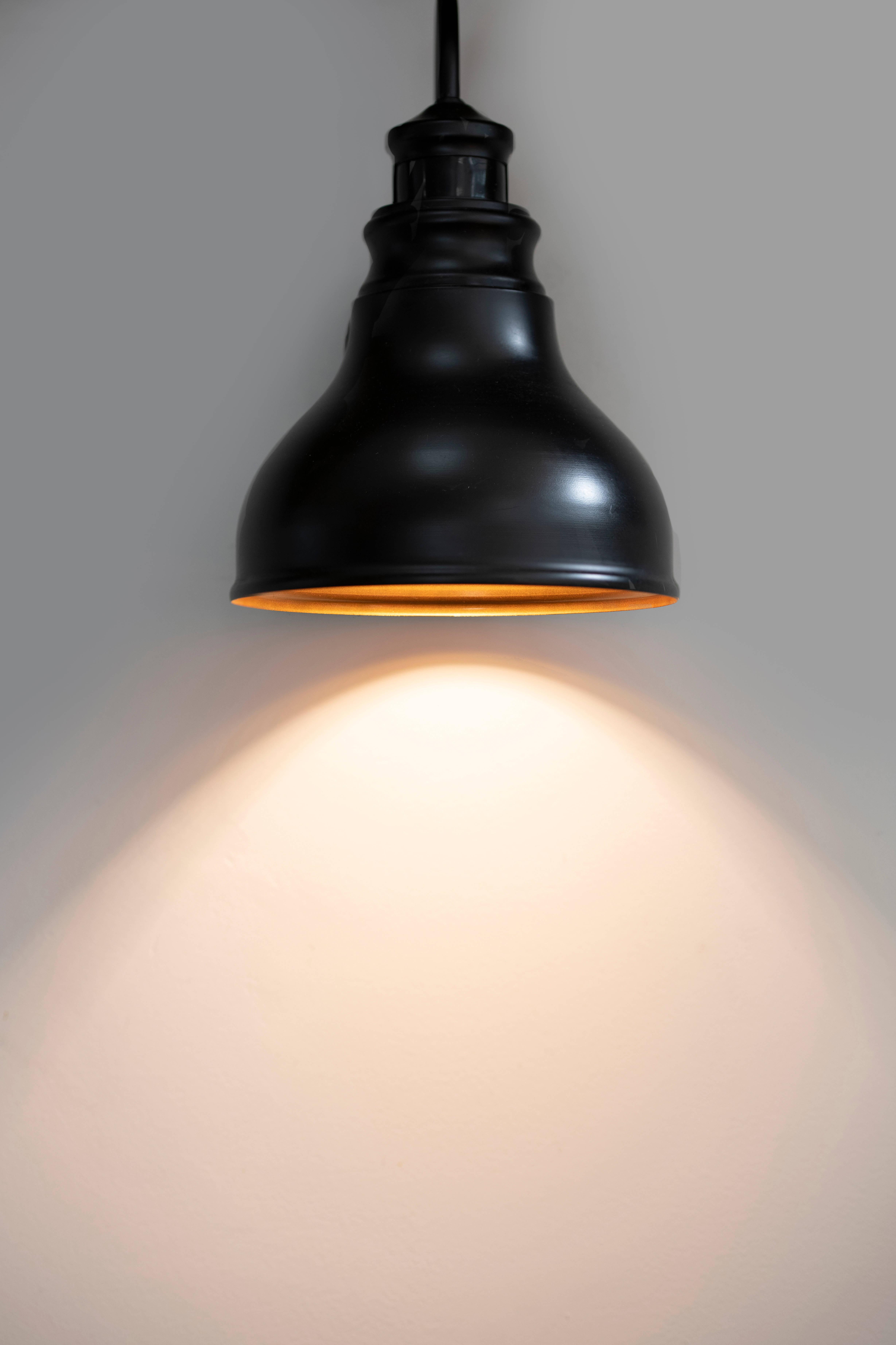 Black Pendant Lamp Turned On — 4915x7373 wallpaper