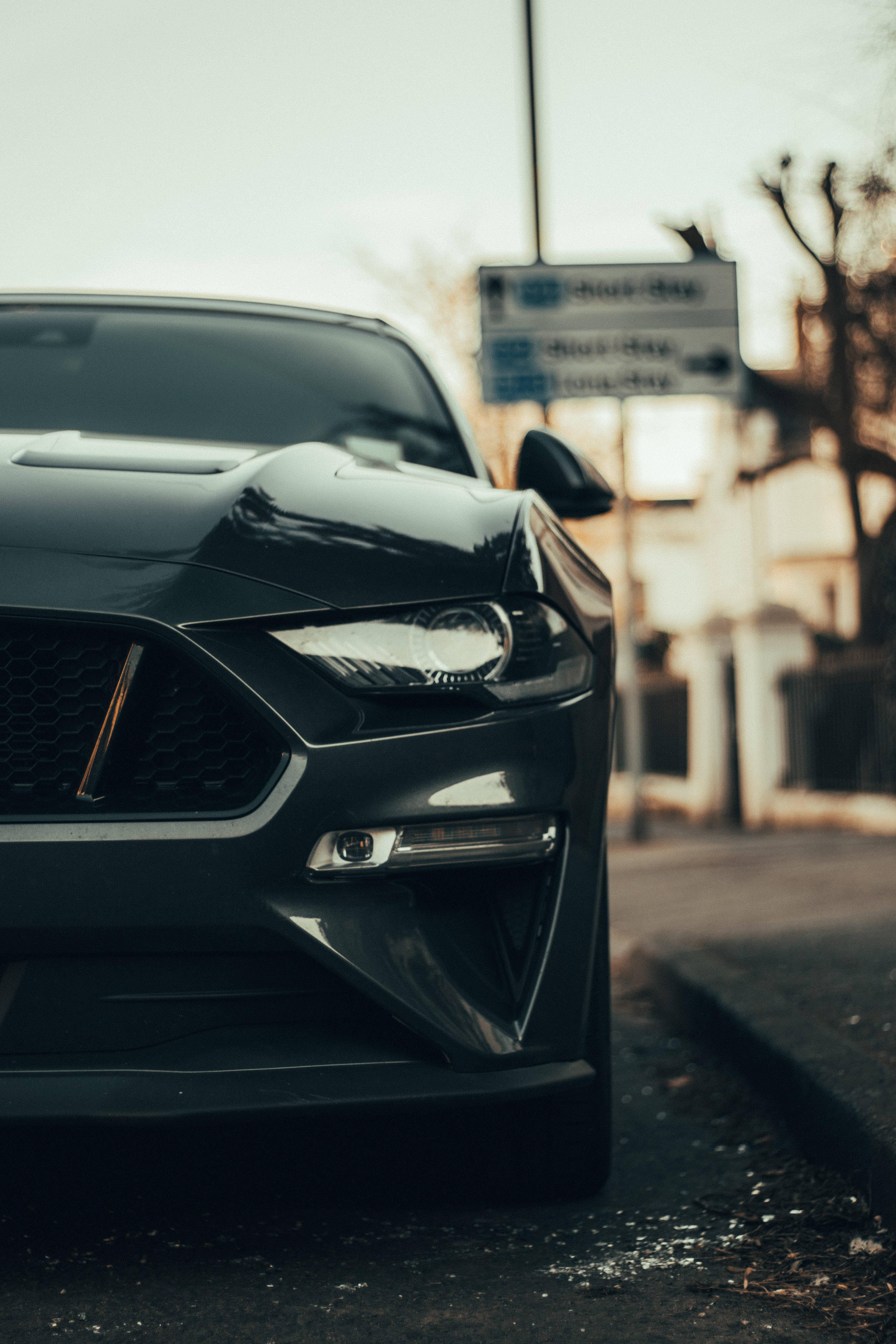Black Sports Car in Half-View — 3845x5767 wallpaper