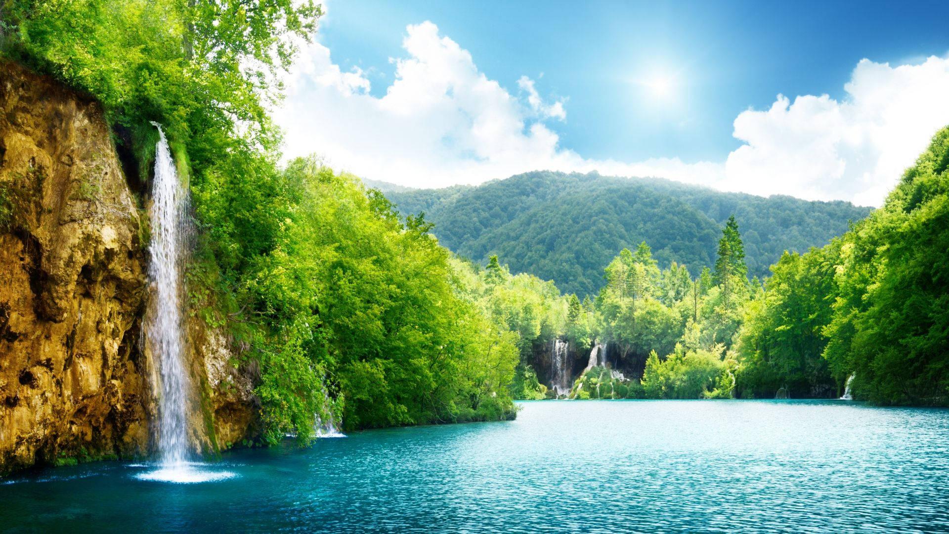Breathtaking Rocky Mountain Waterfall and Lake — 1920x1080 wallpaper