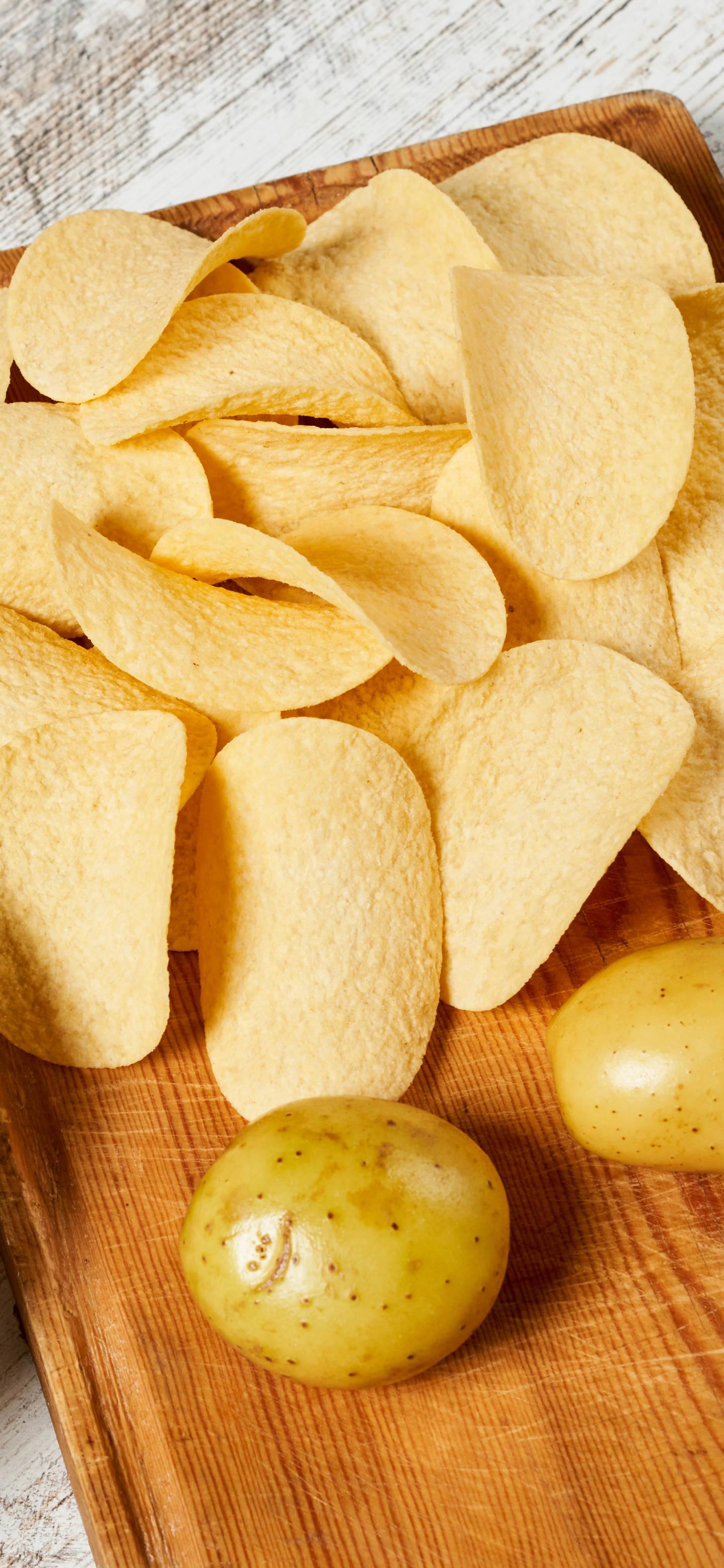Bright and Crisp iPhone 13 Pro Paired with Delicious Potato Chips — 1440x3120 wallpaper