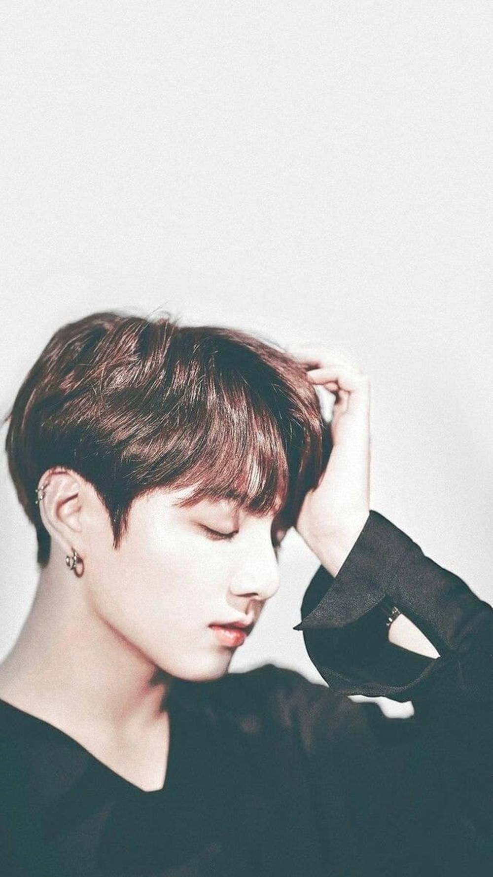 BTS JK Dramatic Pose Shot — 1000x1778 wallpaper