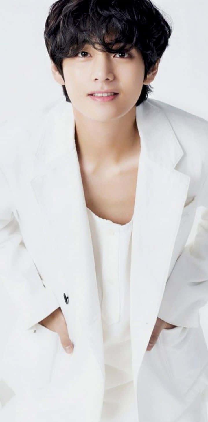"BTS V exudes confidence in his striking fashion style". — 719x1458 wallpaper