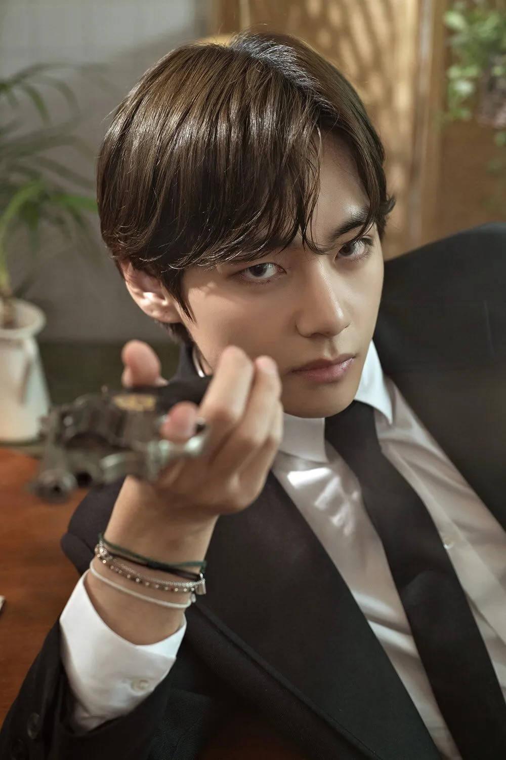 BTS V Holding Gun — 1000x1500 wallpaper