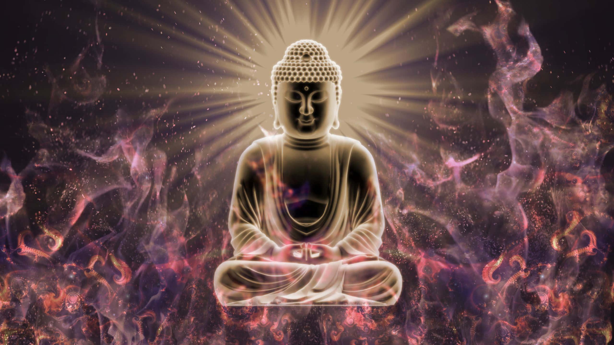 buddha in flames with a golden halo — 2560x1440 wallpaper