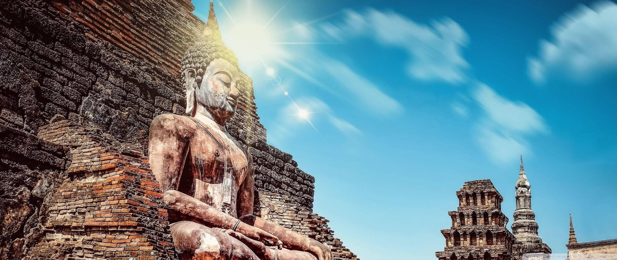 Buddha Statue Under Sun — 2560x1080 wallpaper