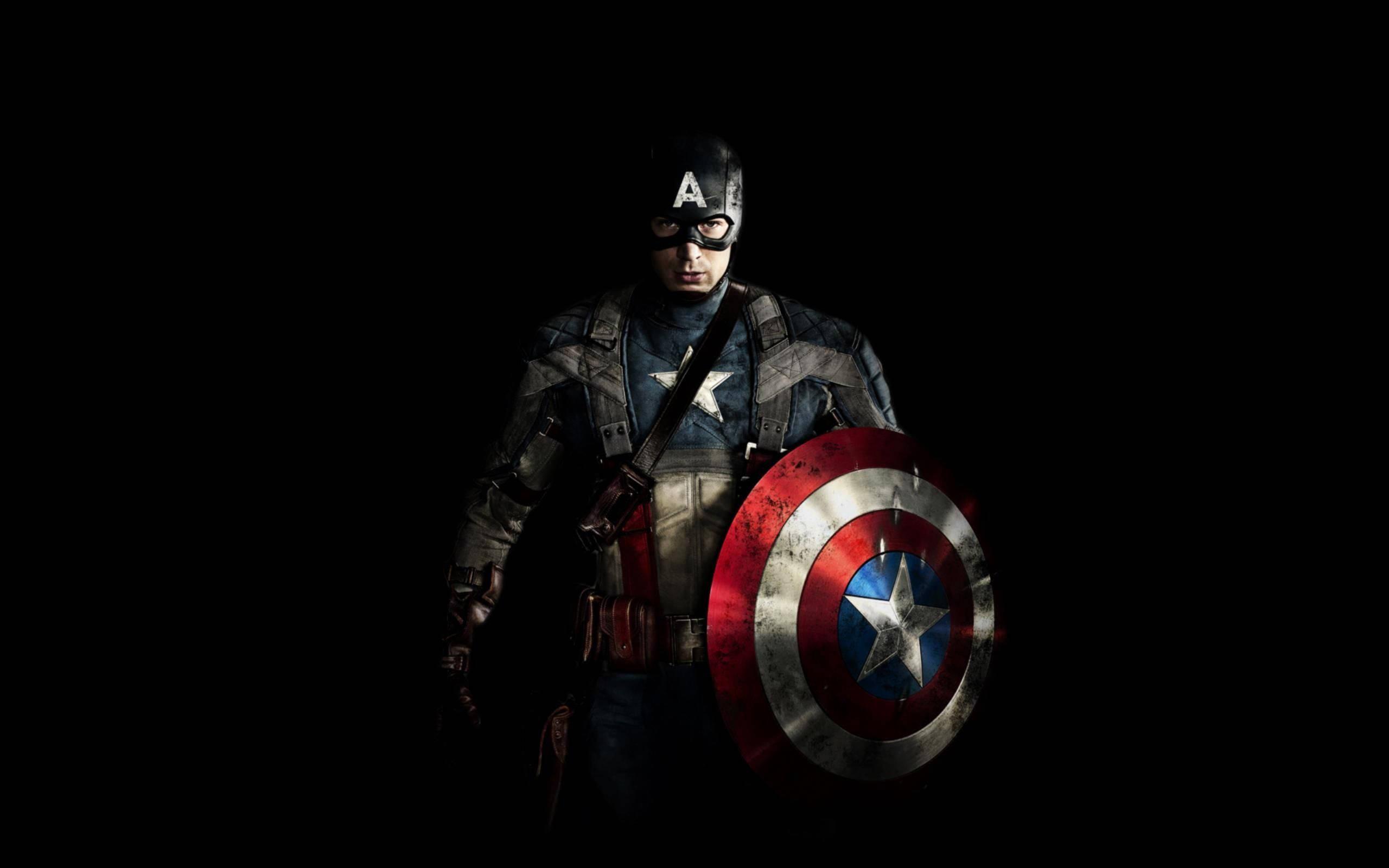 Captain America stands tall and proud in the dark night. — 2560x1600 wallpaper