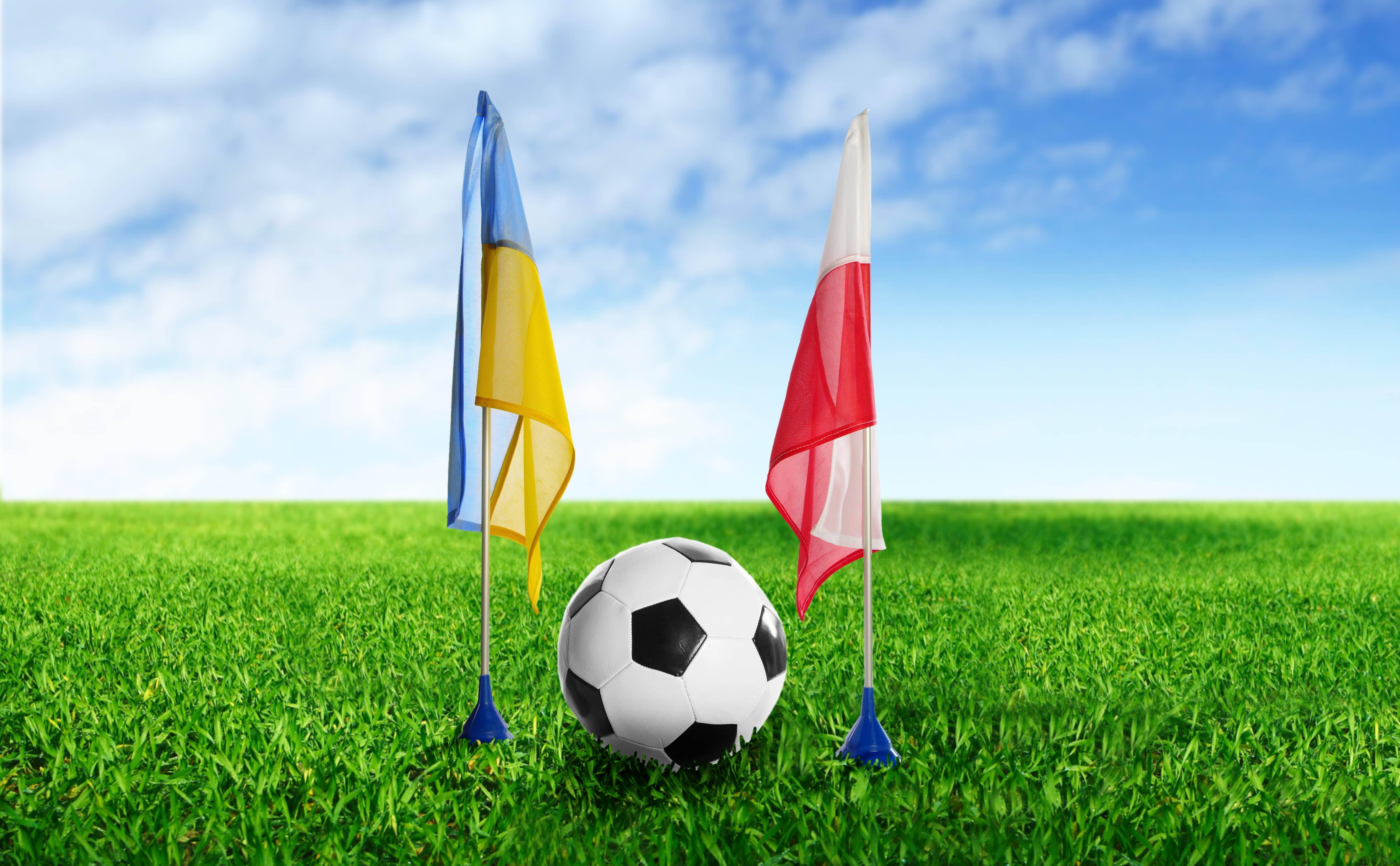 An Intense Football Match Between Ukraine and Poland — 5021x3108 wallpaper