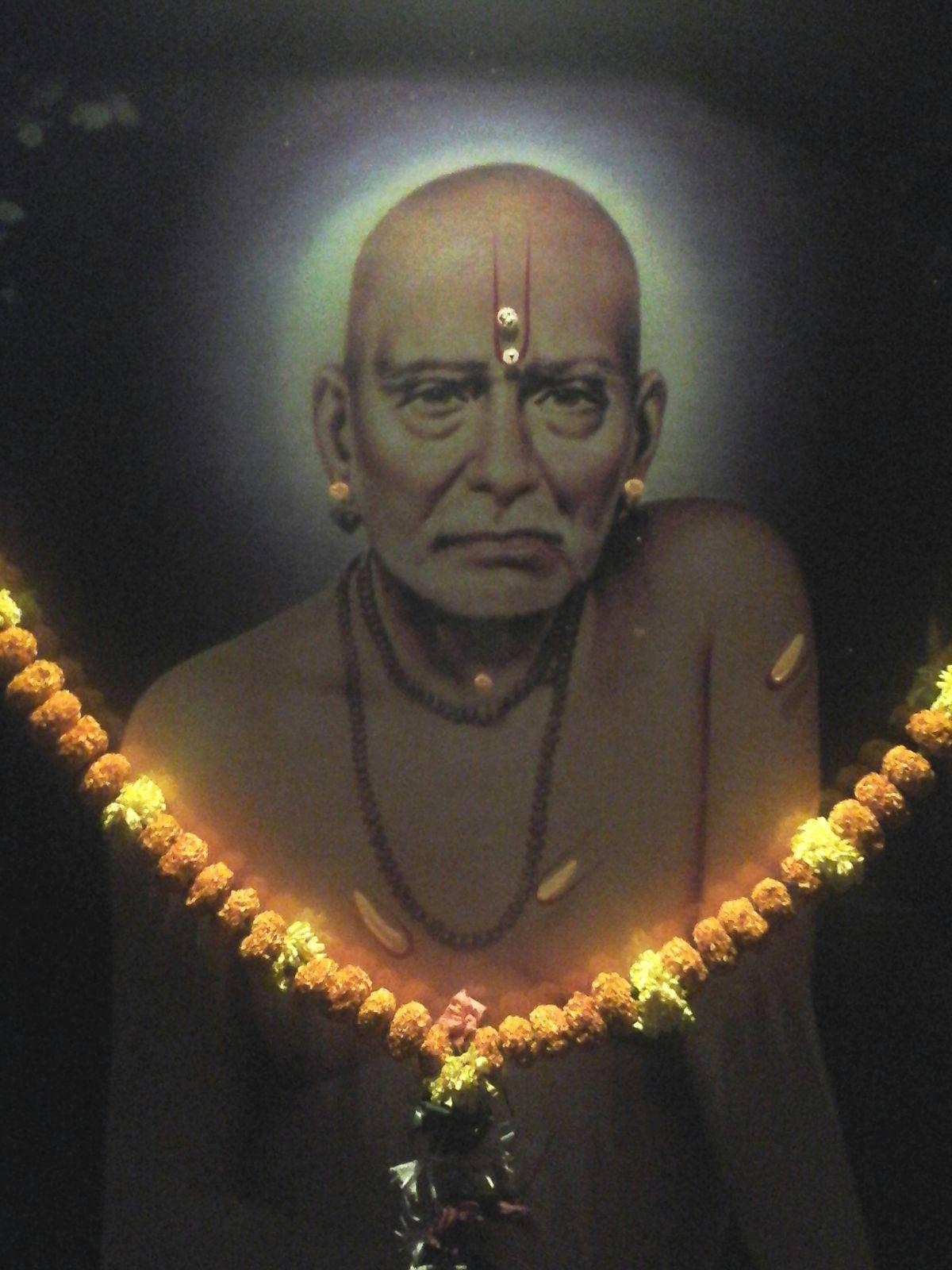 Caption: Divine Portrait of Shri Swami Samarth Adorned with Garland