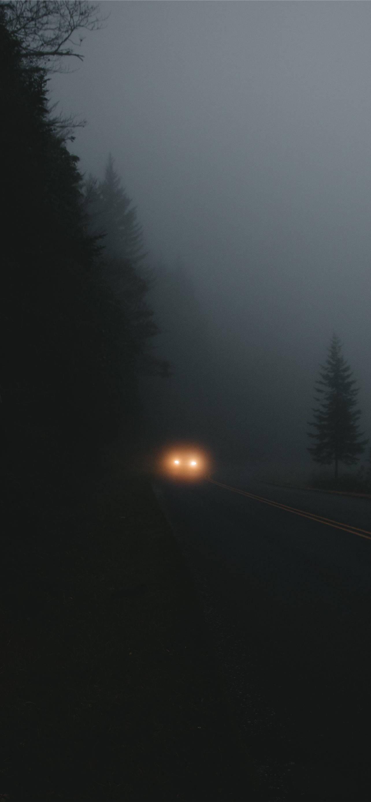 Illuminated Highway In The Dark - iPhone Wallpaper — 1284x2778 wallpaper
