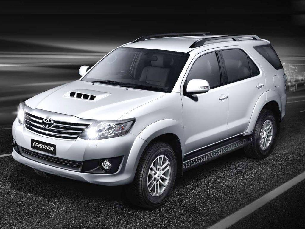 Silver 2012 Toyota Fortuner Parked on a Scenic Roadway — 1024x768 wallpaper