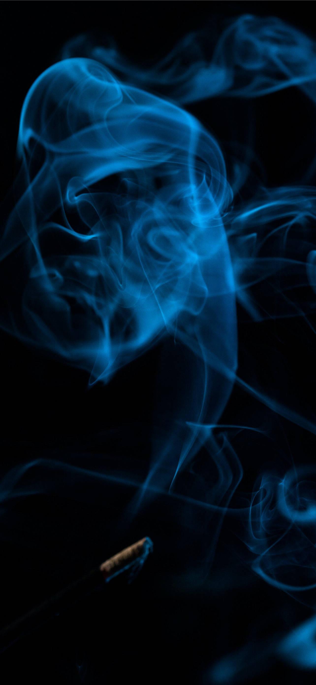 Captivating Blue Smoke on iPhone Dark Background — 1284x2778 wallpaper