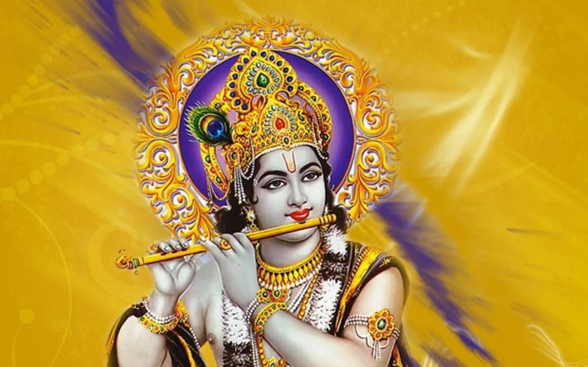 Captivating Image of Yellow-Based Lord Krishna with His Flute