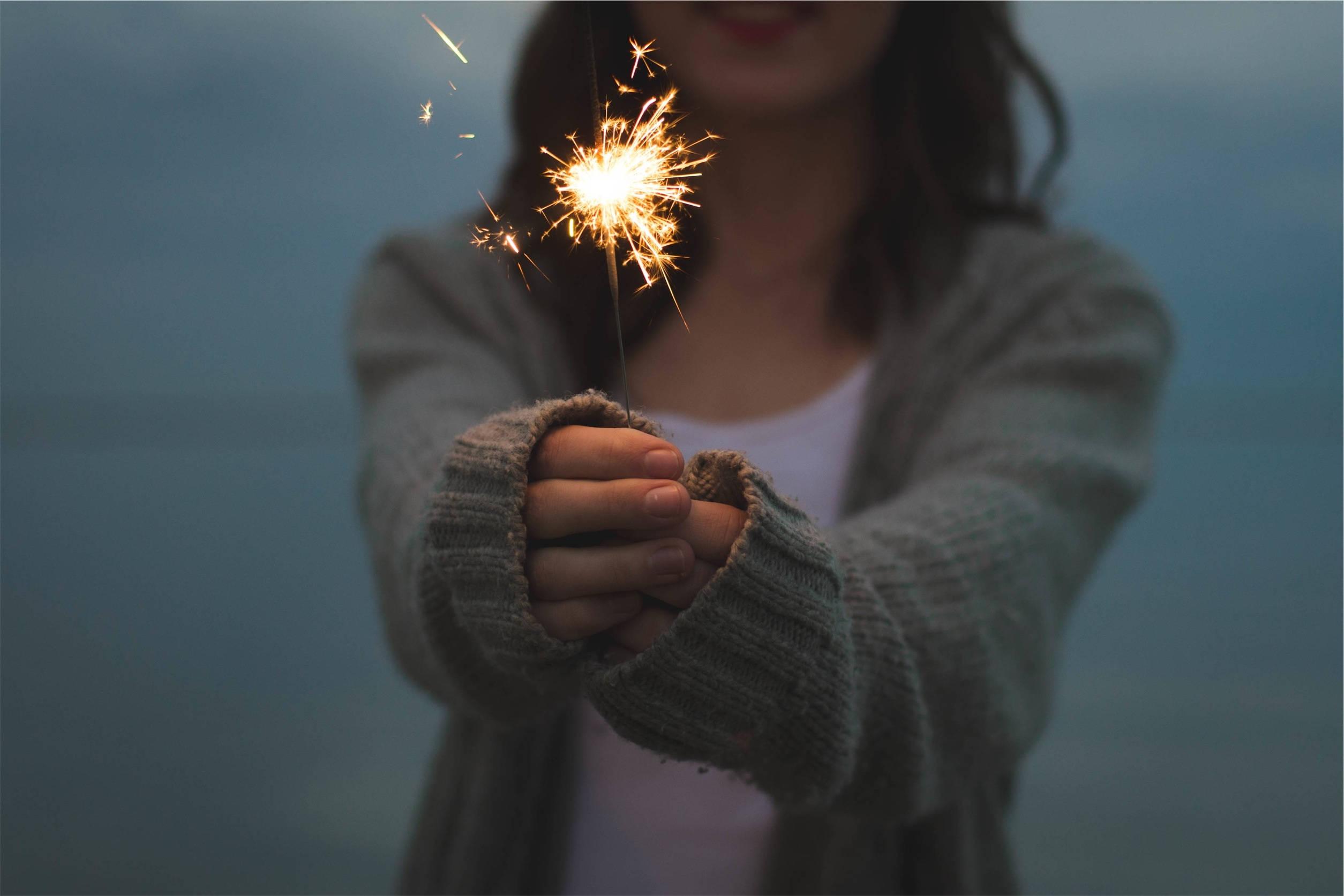 Celebrating a Special Occasion with a Sparkler — 2509x1673 wallpaper