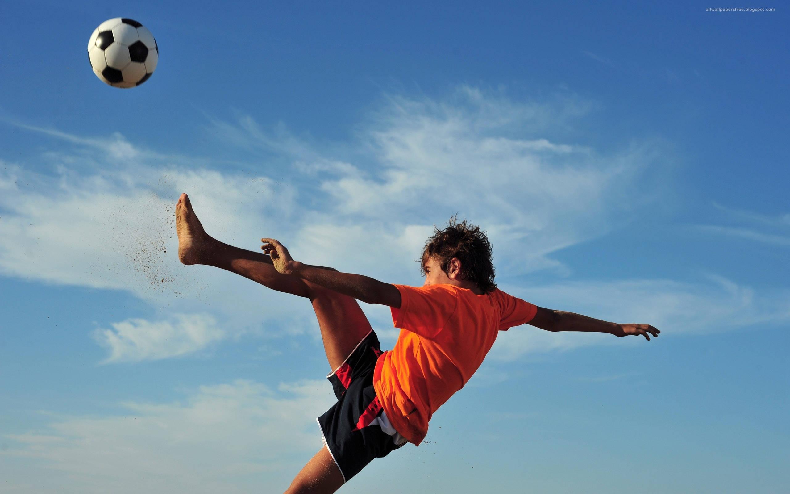 Cool Soccer Ball High Kick — 2560x1600 wallpaper