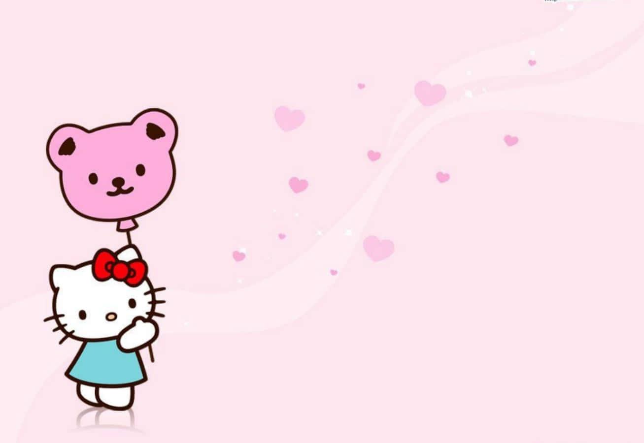 Cute Hello Kitty Themed Laptop — 1307x900 wallpaper