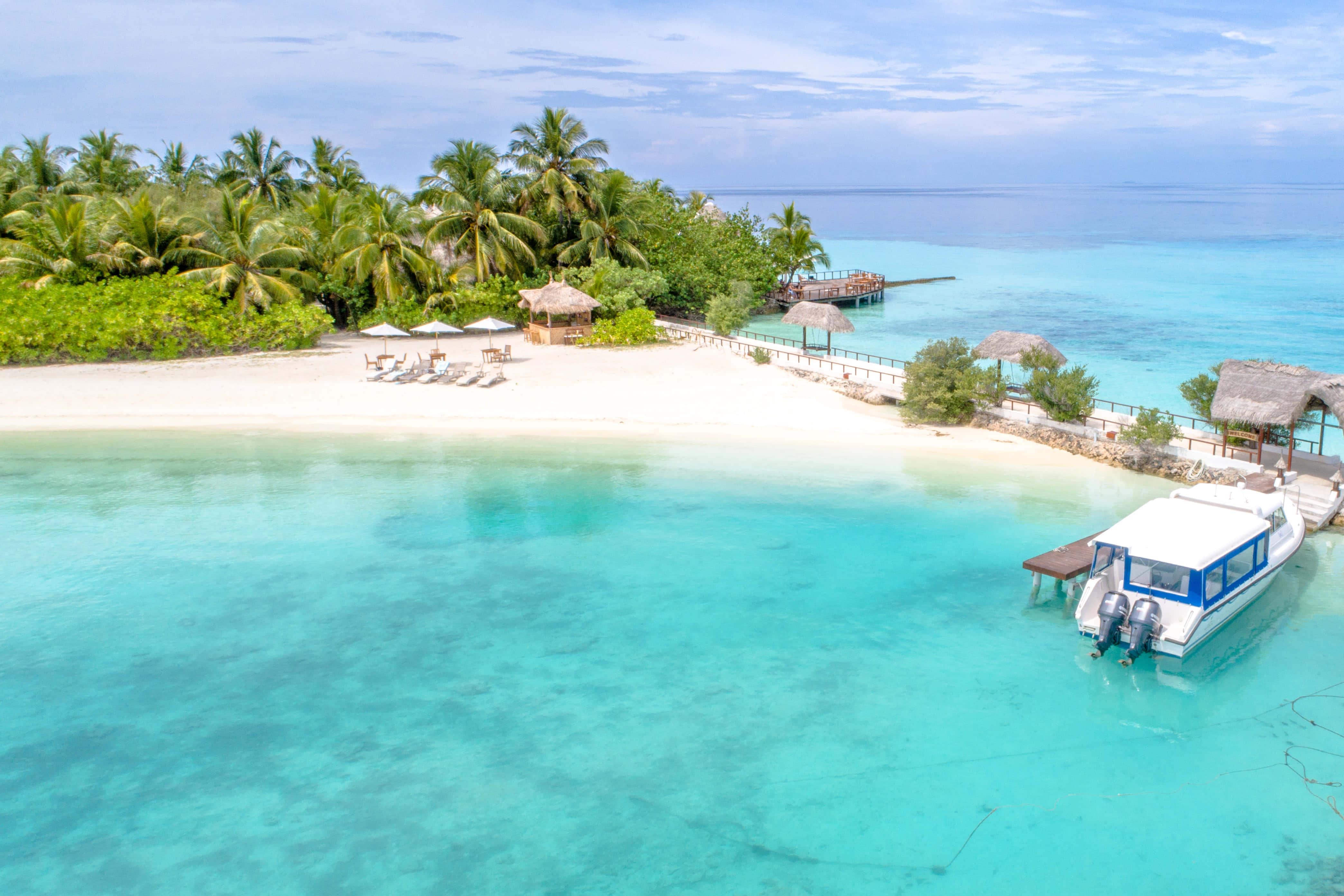 Discover paradise on this tropical beach — 4177x2785 wallpaper