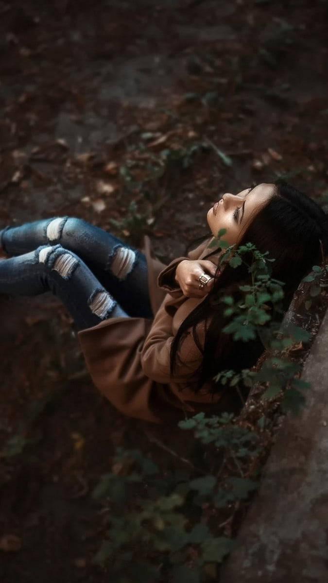 Dramatic Girl Sitting In Forest Alone — 675x1200 wallpaper