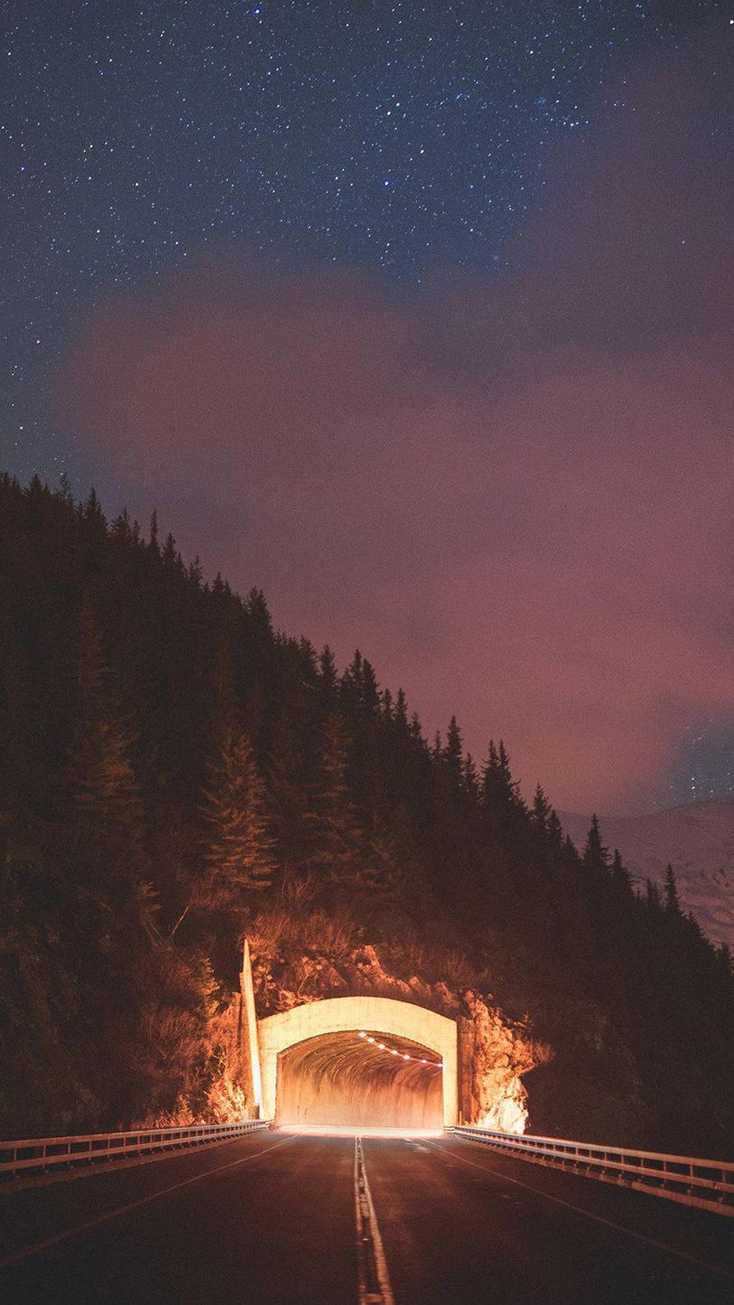 Driving Through a Winding Road Tunnel