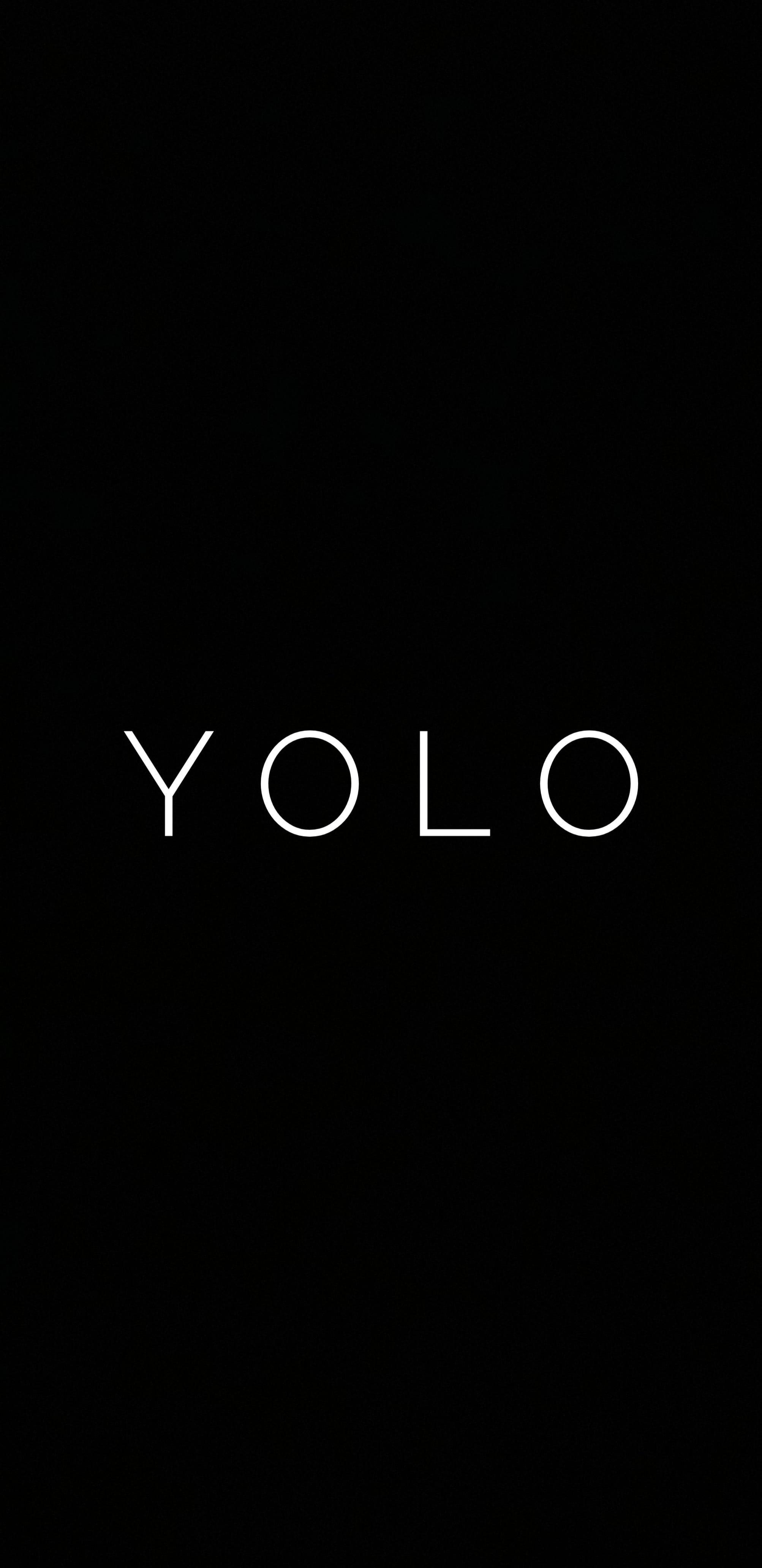 Embrace Life with 'YOLO' Motivation on a Black Backdrop — 2006x4128 wallpaper