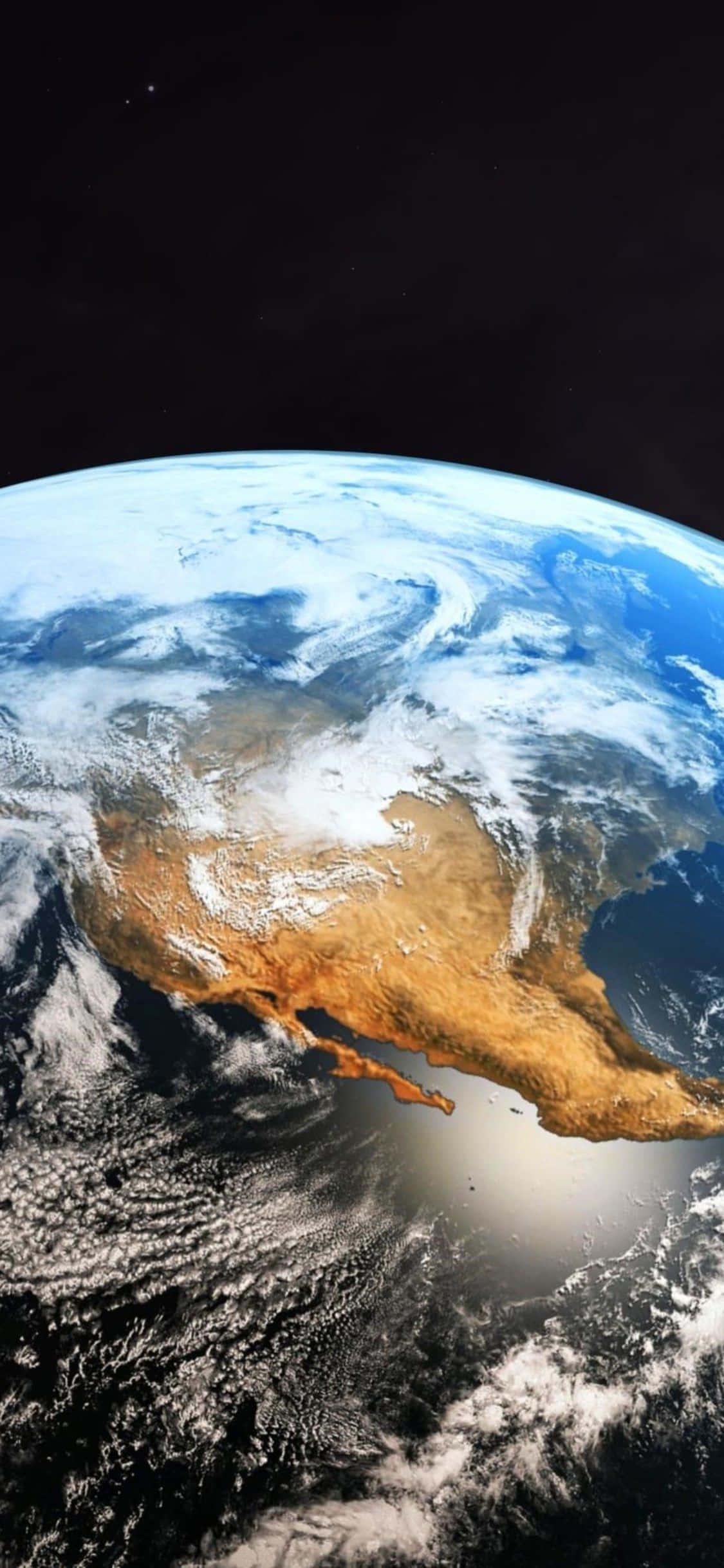 Embrace the beauty of our planet from the palm of your hand. — 1125x2436 wallpaper