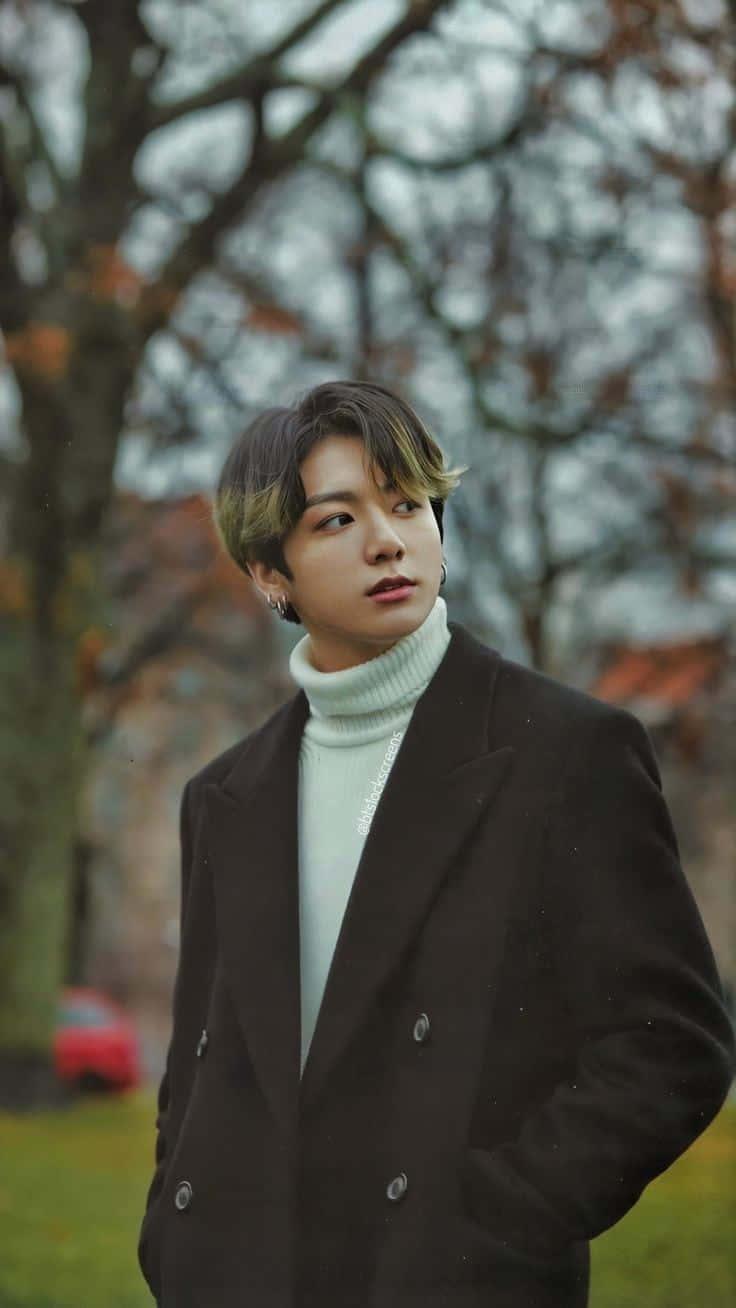 Enigmatic Jungkook in a stylish black outfit — 736x1308 wallpaper