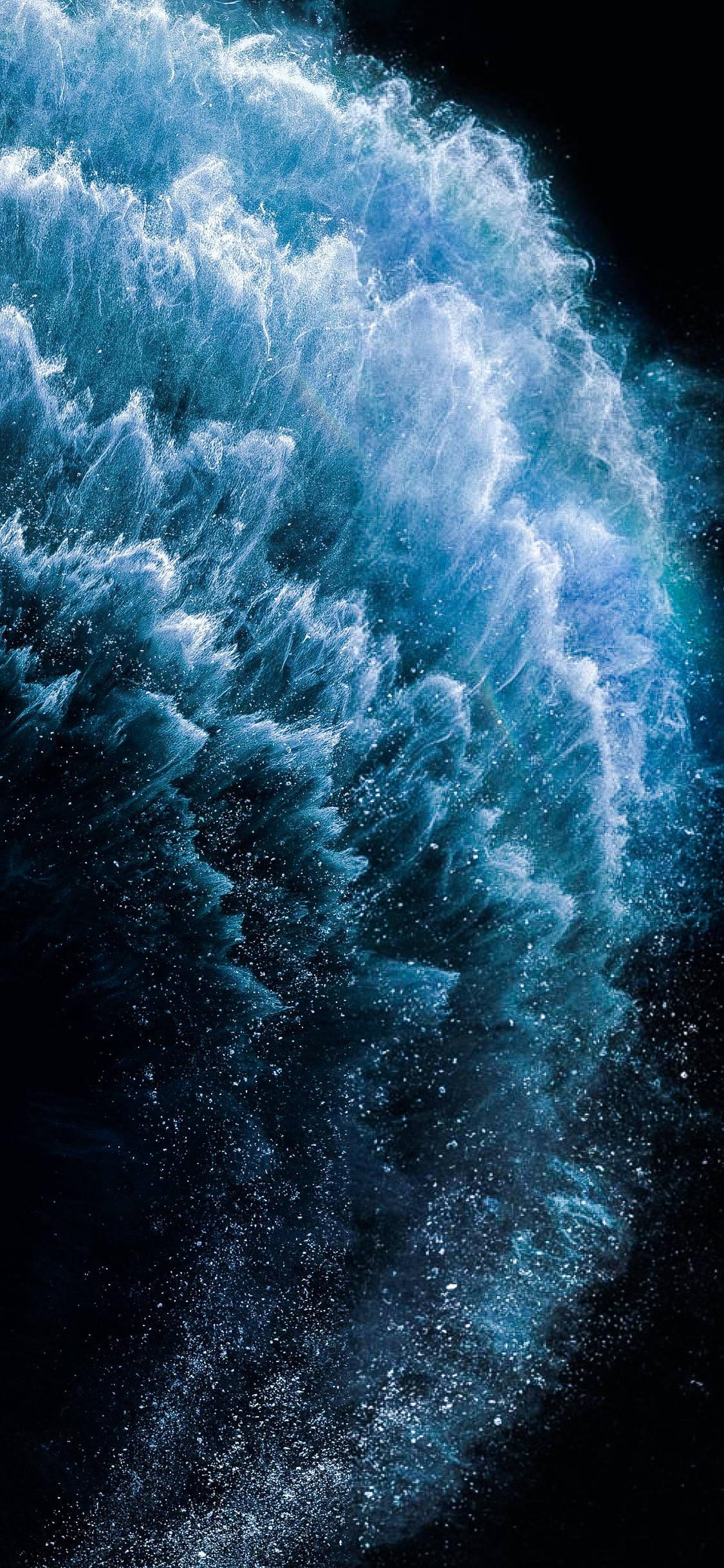 Explosion Of Blue Dust Samsung Full HD — 1125x2436 wallpaper