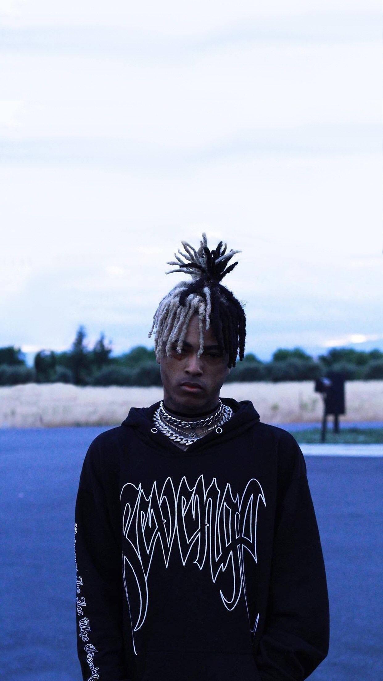 Fans of XXXTentacion Rock His Signature Black Hoodie — 1242x2208 wallpaper