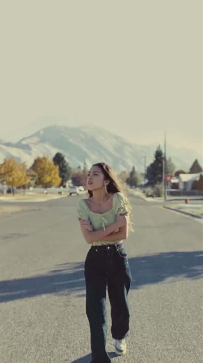 Feel the Booming Energy of Olivia Rodrigo — 673x1200 wallpaper